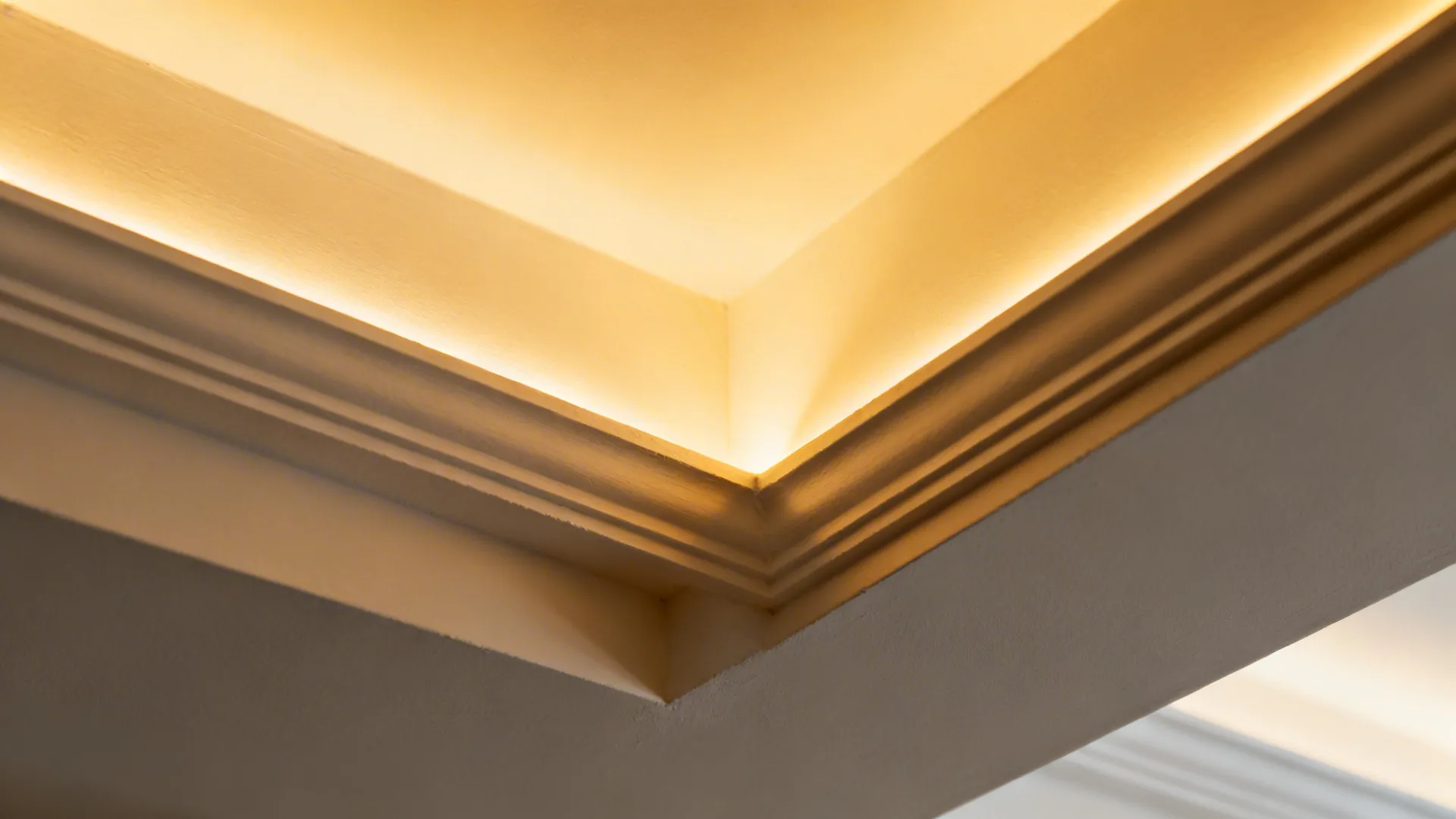 Close-up of floating core ceiling with warm recessed LED and clean shadow gap.