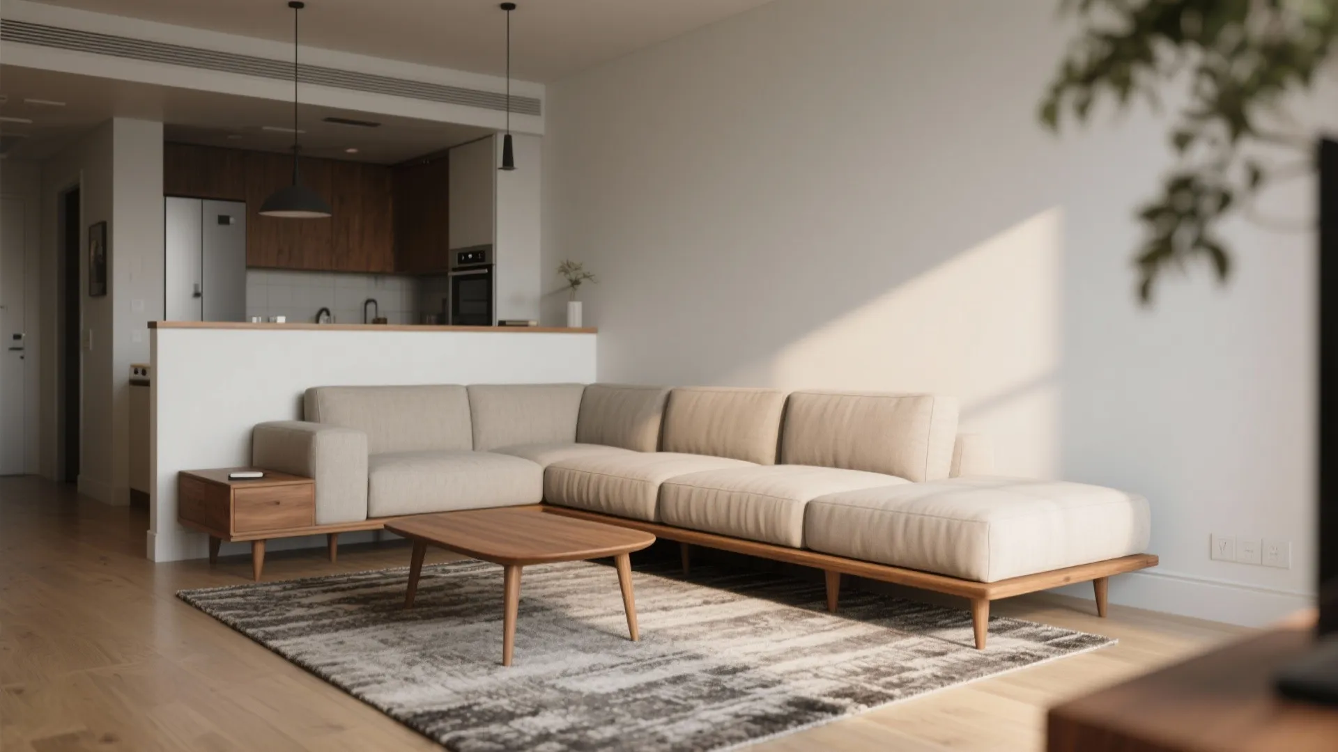 Large beige corner sofa in an open living room near a kitchen and wooden table