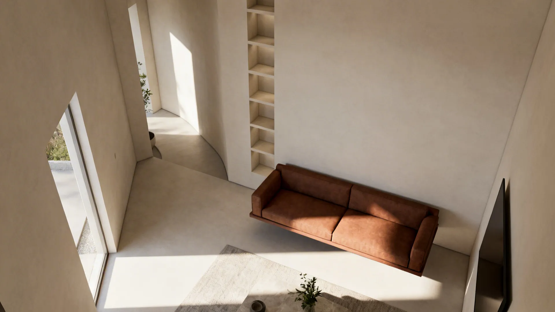 High angle view of a brown sofa in a minimalist room with warm natural sunlight