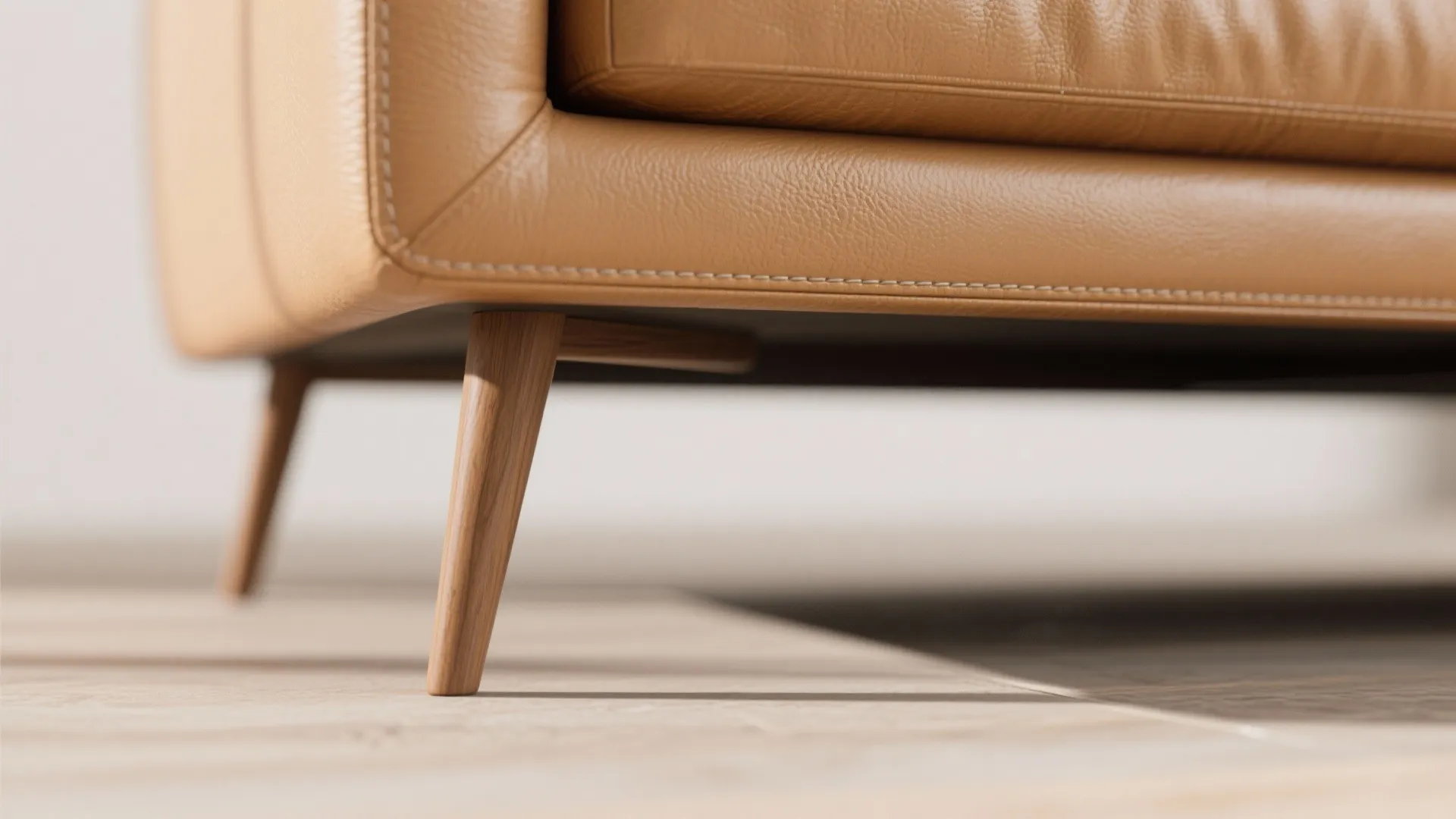 2. Use color and legs to “float” the sofa