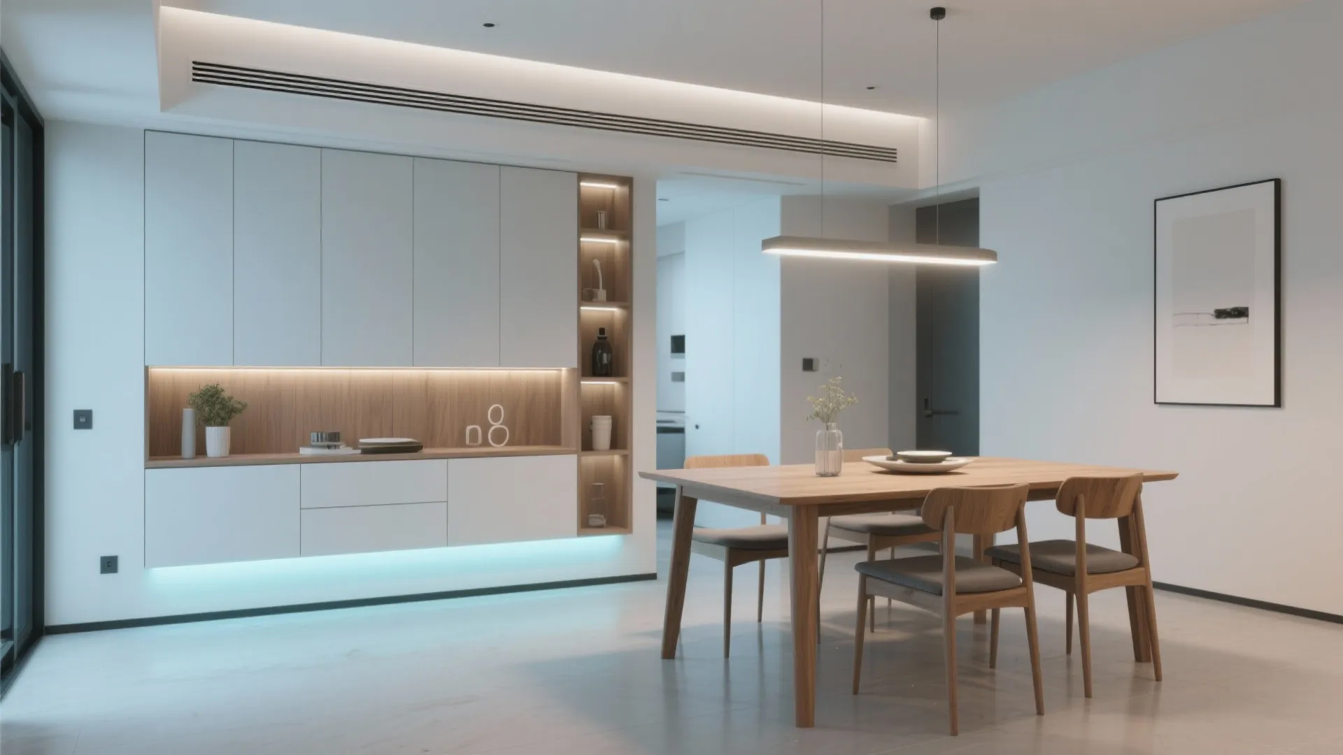 Minimalist white kitchen cabinet with wood accents and a wooden dining table under linear light