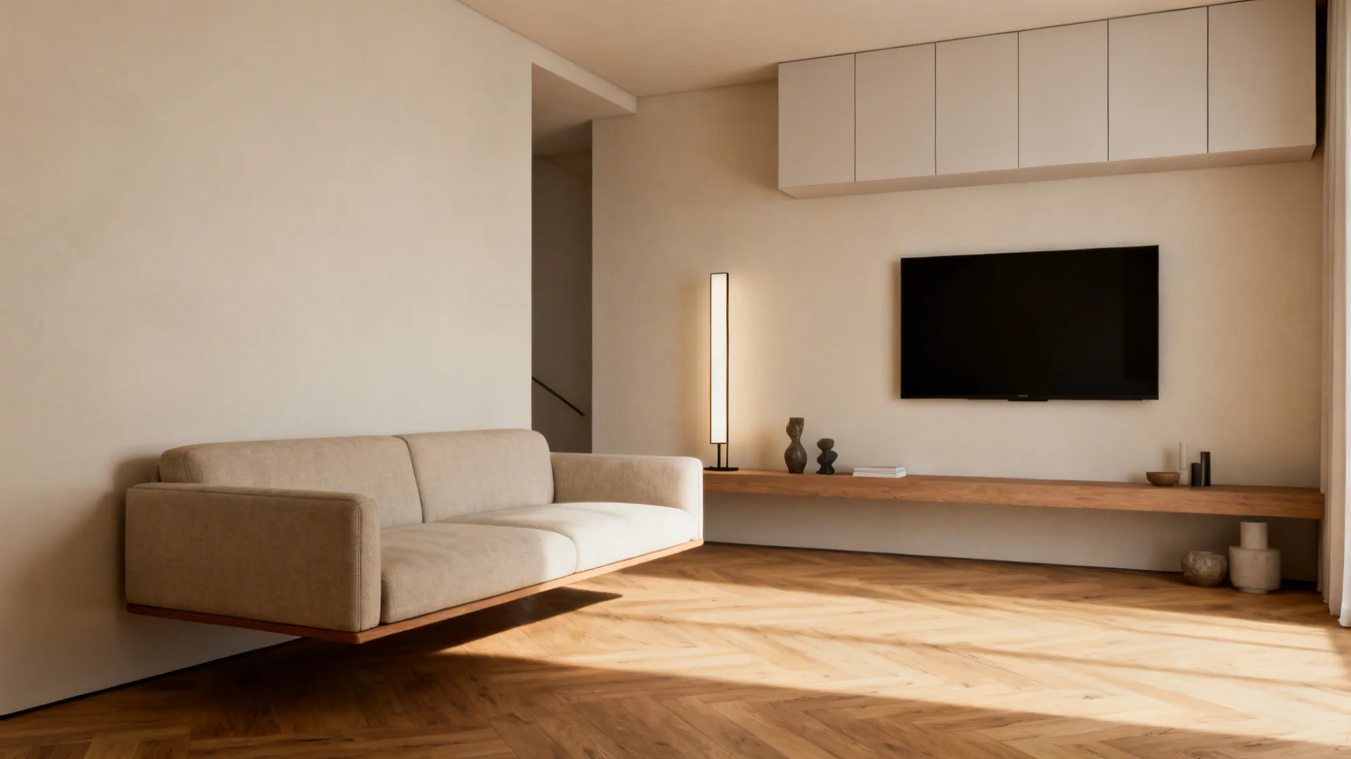 Floating sofa set a few inches from the wall with a wall-mounted TV and slim console behind it.