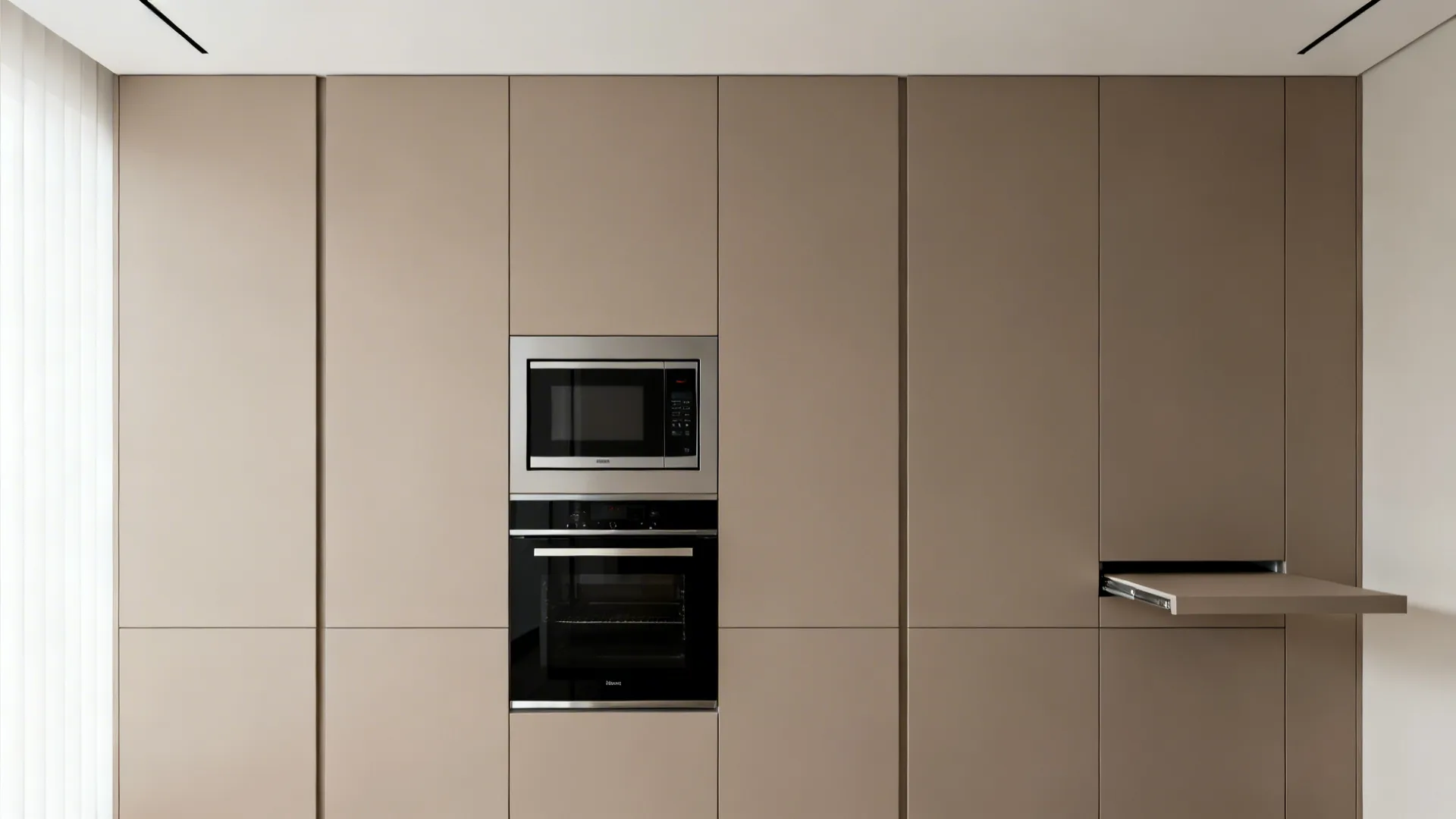 Flush appliance wall with stacked oven and microwave, aligned panels, and minimal reveals.