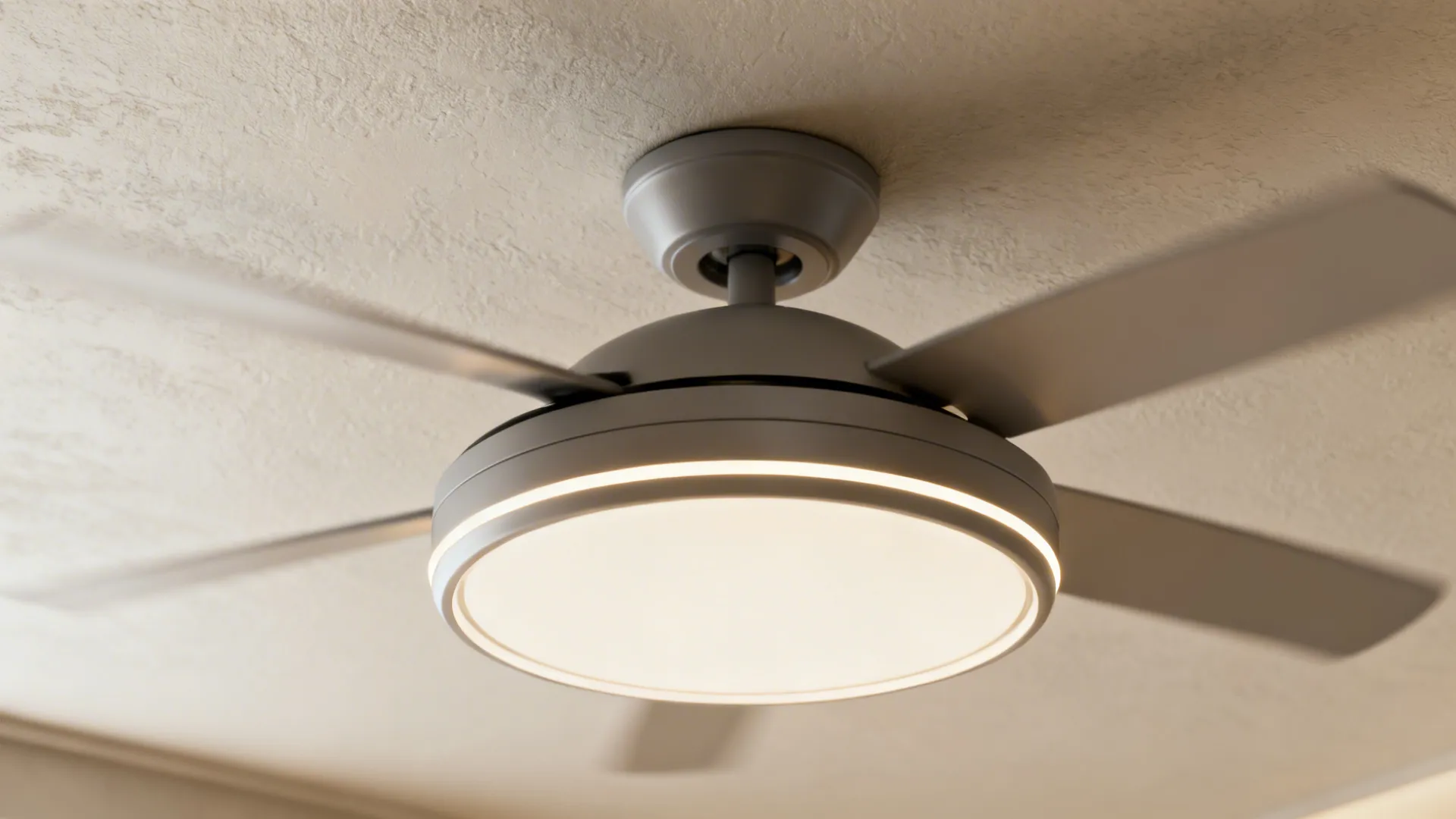 Close-up of a low-profile flush mount ceiling fan with integrated LED on a low ceiling.