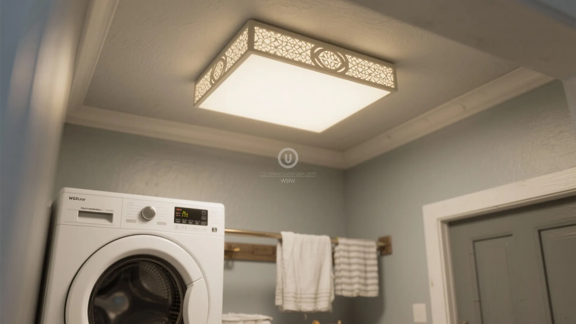 Flush-mount ceiling fixture with integrated diffuser in a small laundry room