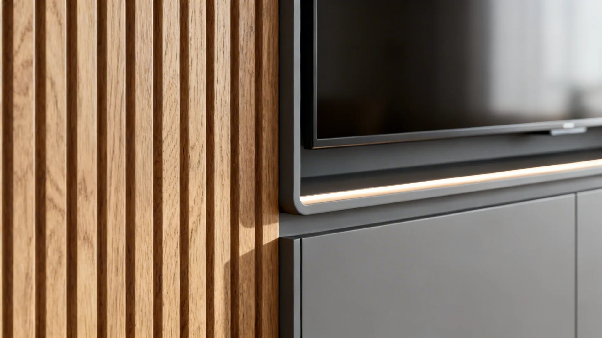 Macro of fluted oak panel and matte niche with a crisp shadow gap and LED channel.