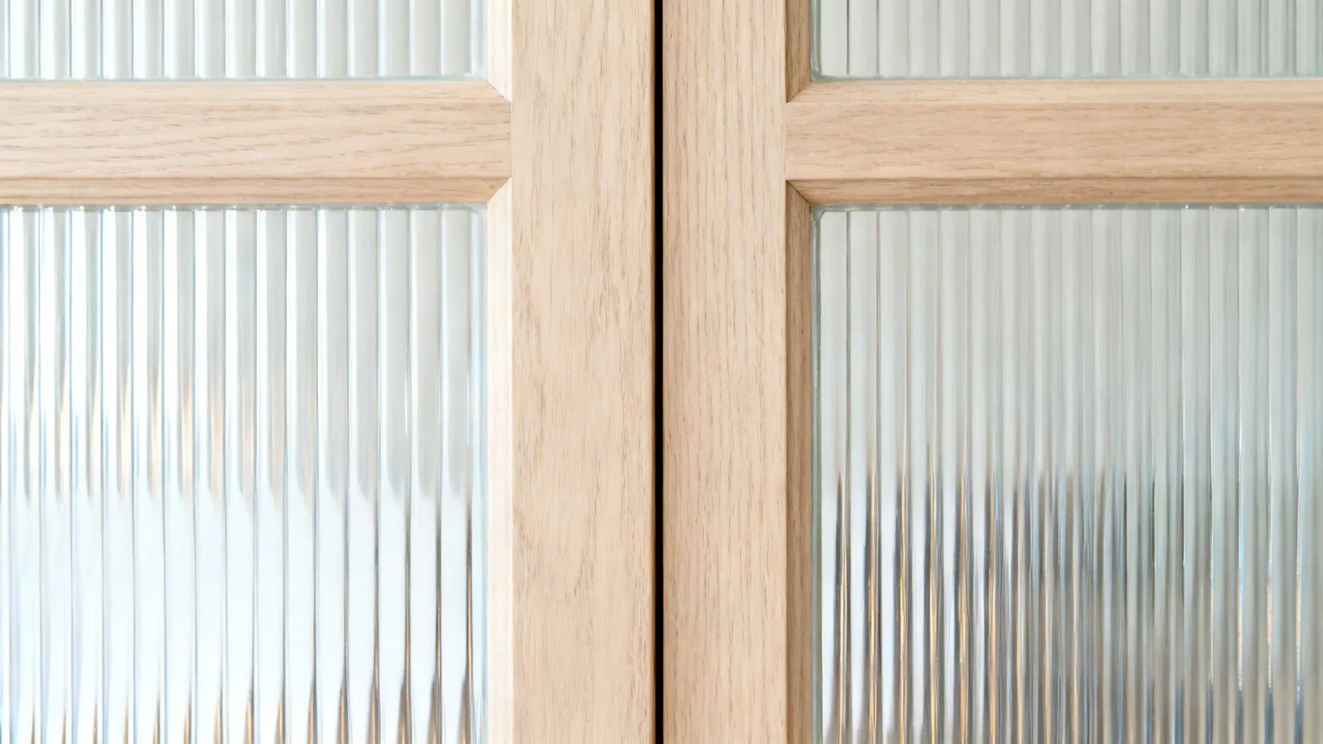 Translucent fluted-glass shoji-style double doors