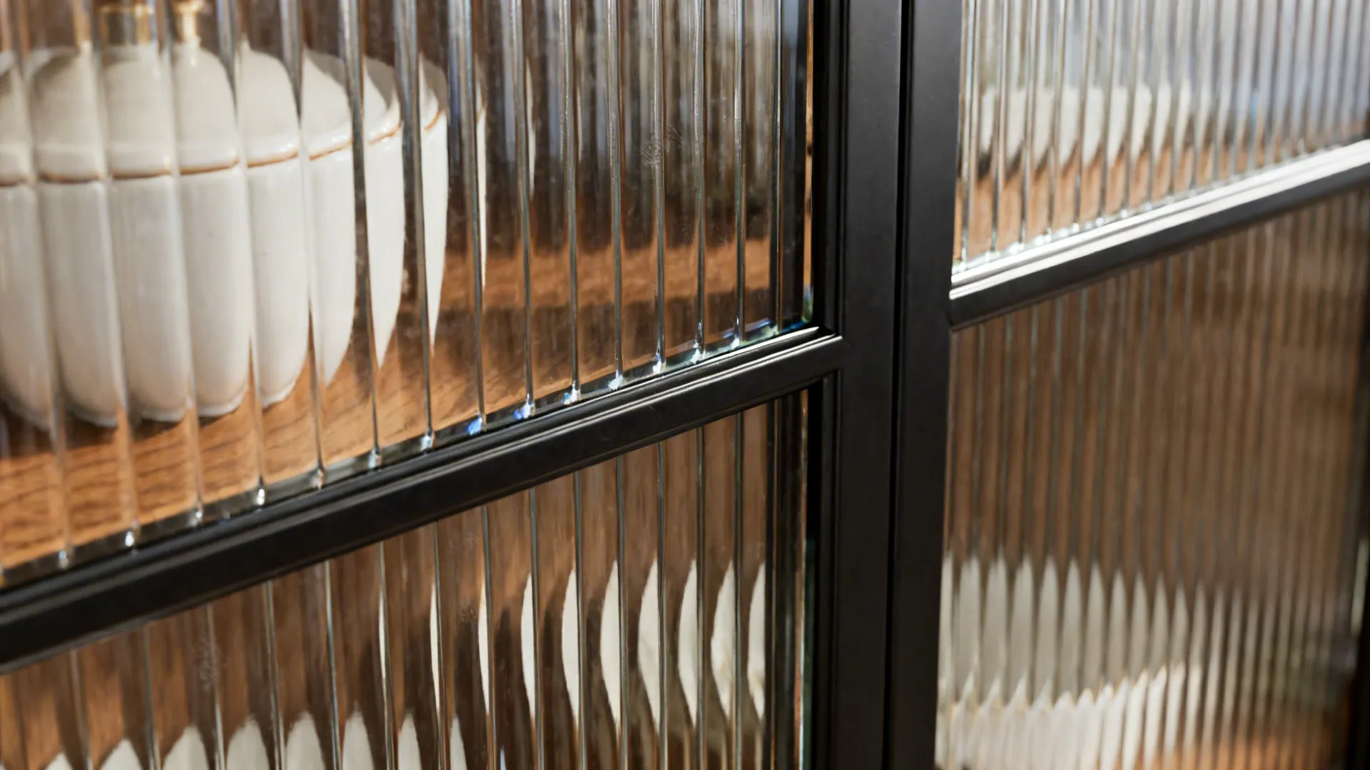 4) Glass for Brightness: Doors, Backsplashes, or Shelves