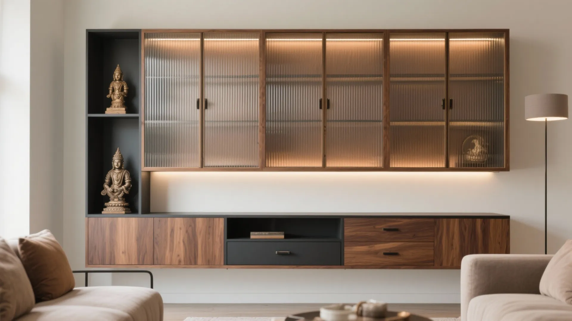 Elegant wood wall cabinet with glass doors and internal lighting displaying statues in living room