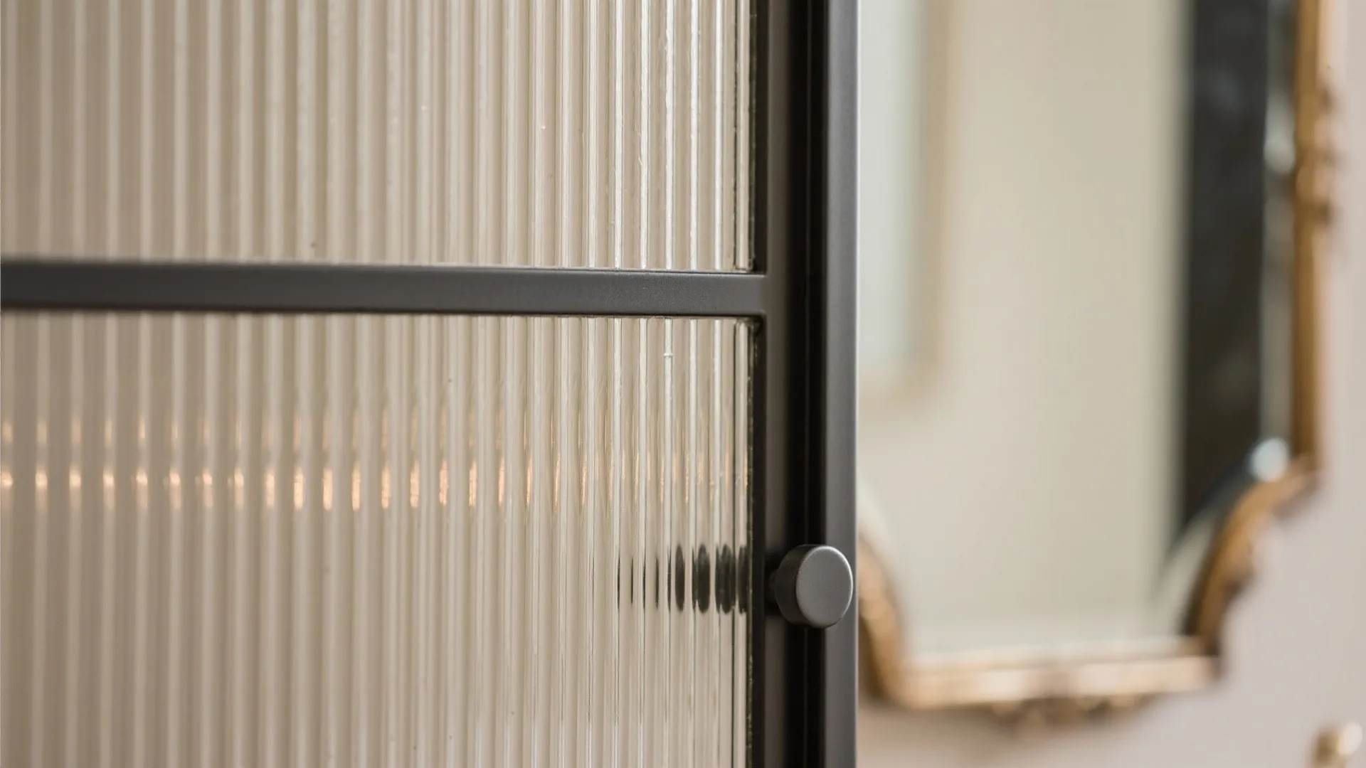 Glass and Light: Framed Partitions and Reflective Surfaces