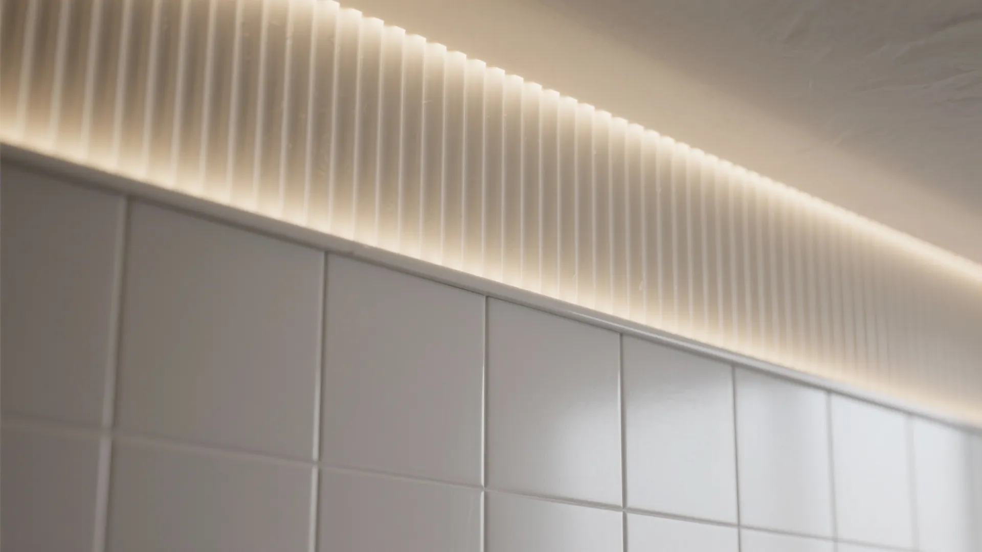 3) Fluted or Textured Tiles with Light Grazing