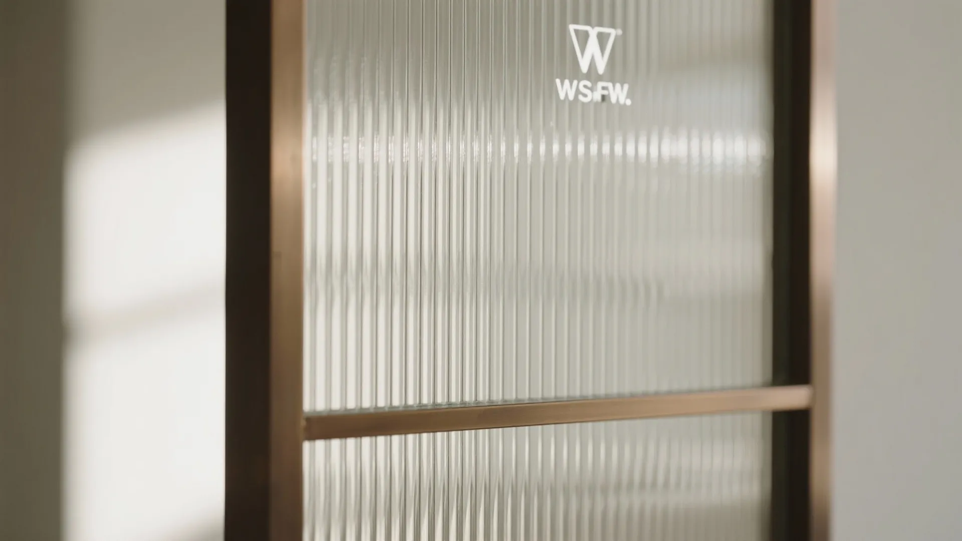 Framed Glass & Fluted Panels: Light, airy separation