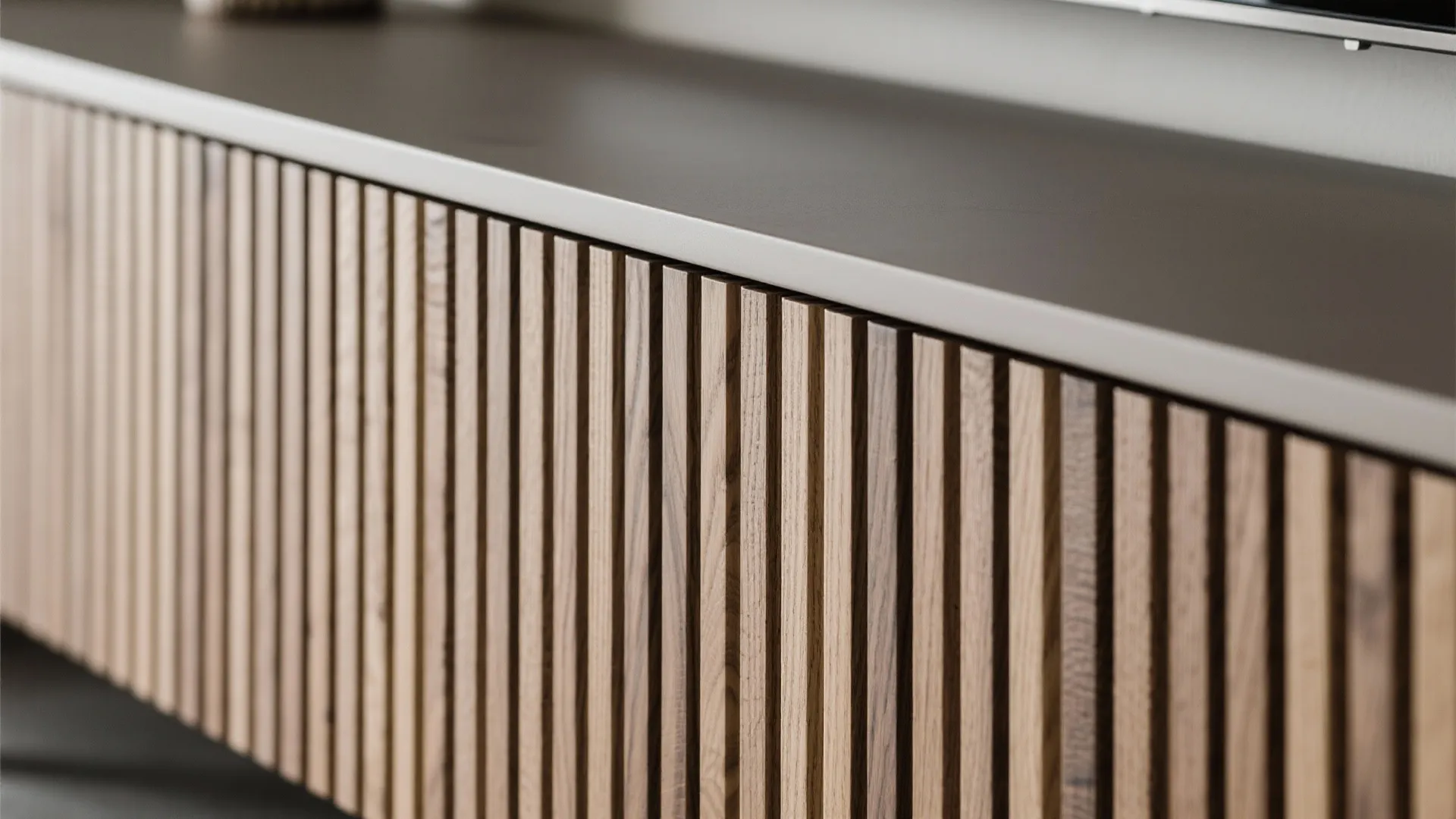 Macro view of warm oak fluted wall texture above a slim floating console