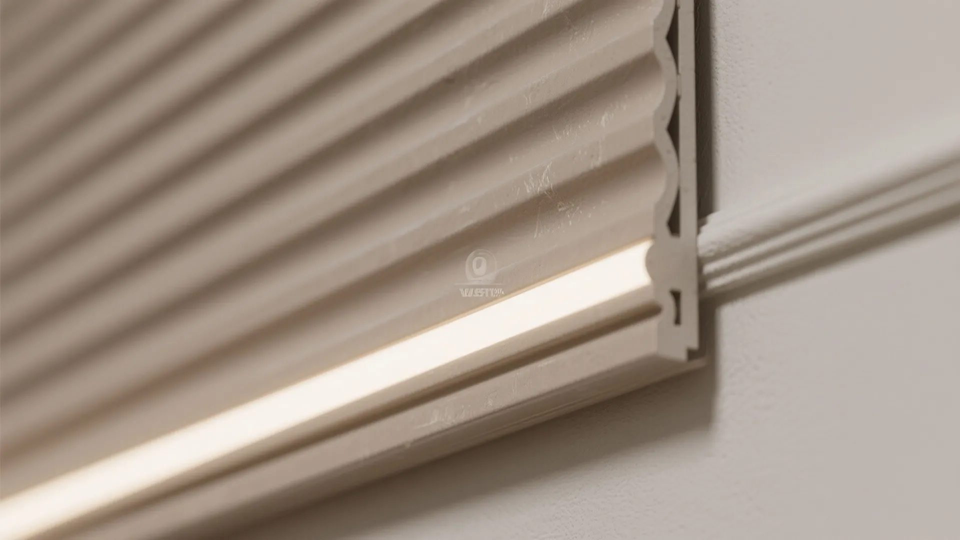 Close up of fluted wall panel texture with a bright integrated light strip and neutral colors