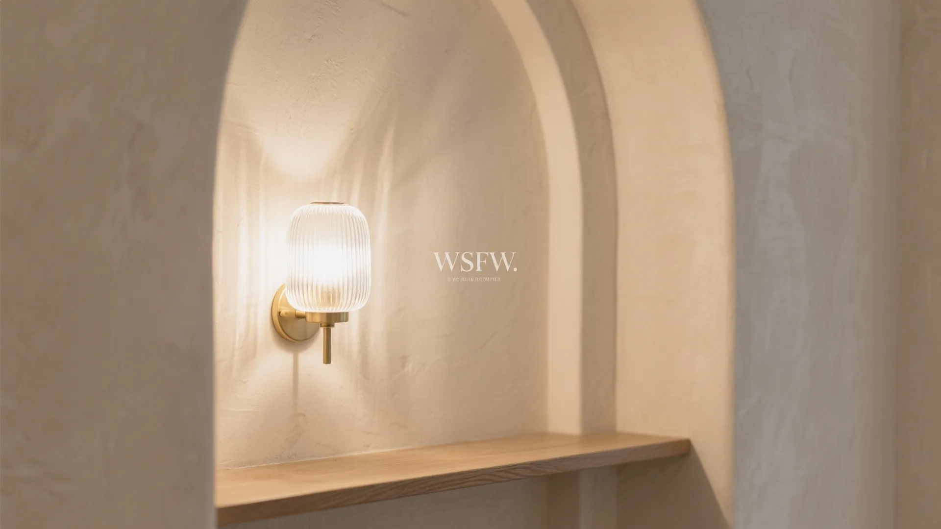 Create one focal moment: art, niche, or arch