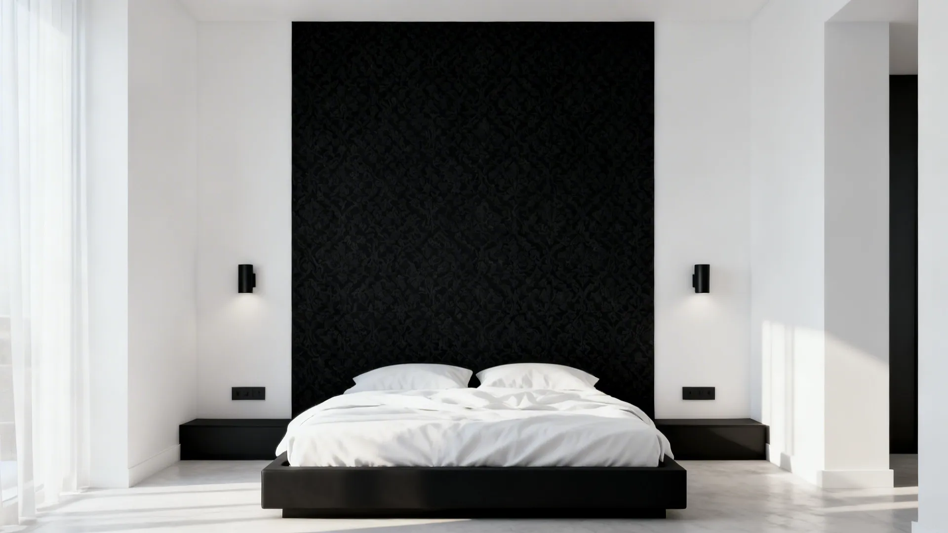 Small bedroom with a matte black focal wall and white surrounding walls, creating depth.