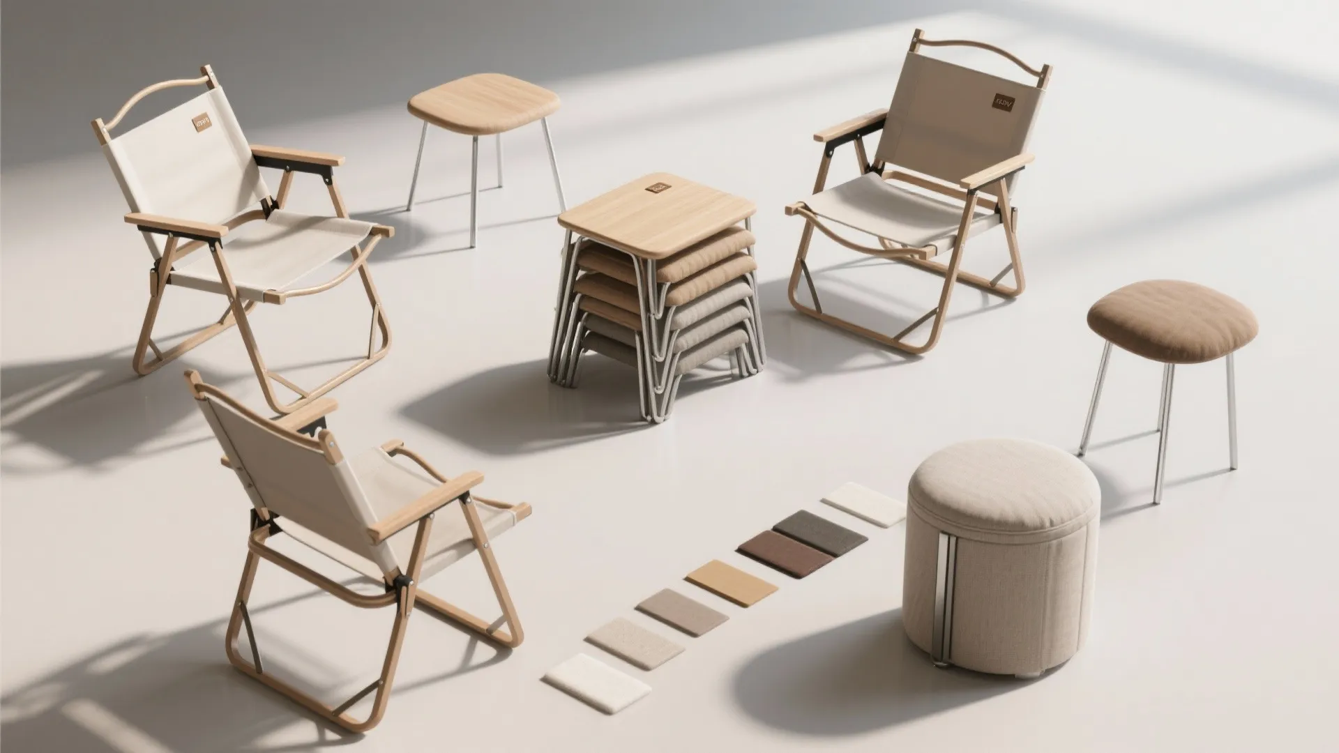 Overhead flatlay of foldable chairs, nesting stools and fabric swatches for compact kitchens