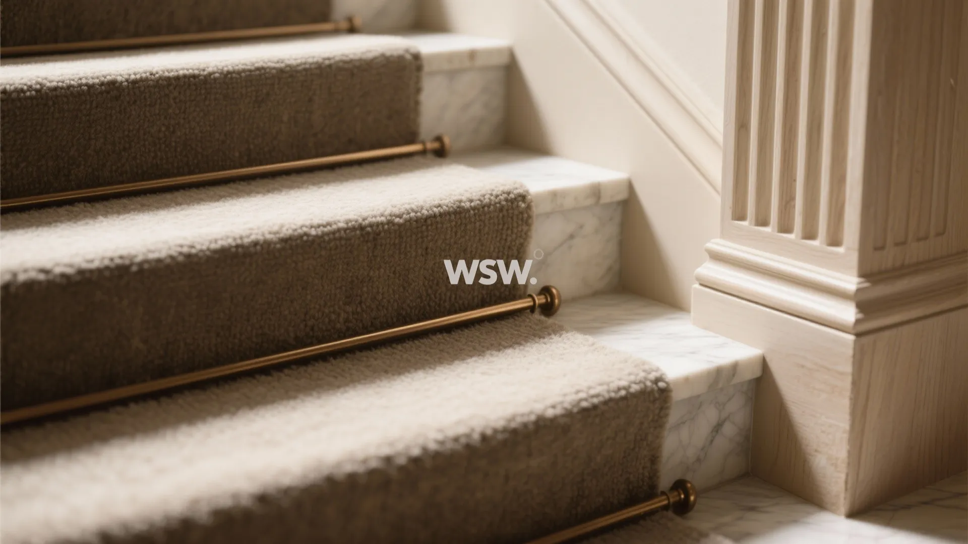 Grand foyer drama with a sculptural stair and skylight