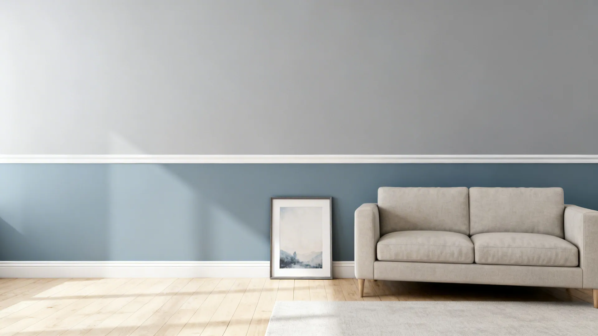 Two-tone wall with French gray above and dusty blue below in a modern living room.