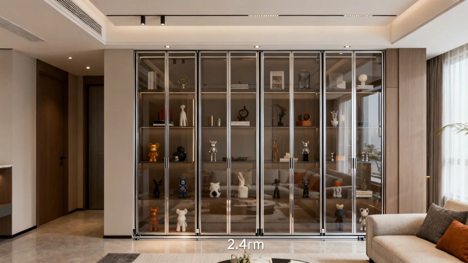 Full-height sliding glass showcase with slim aluminum tracks in a compact living room.