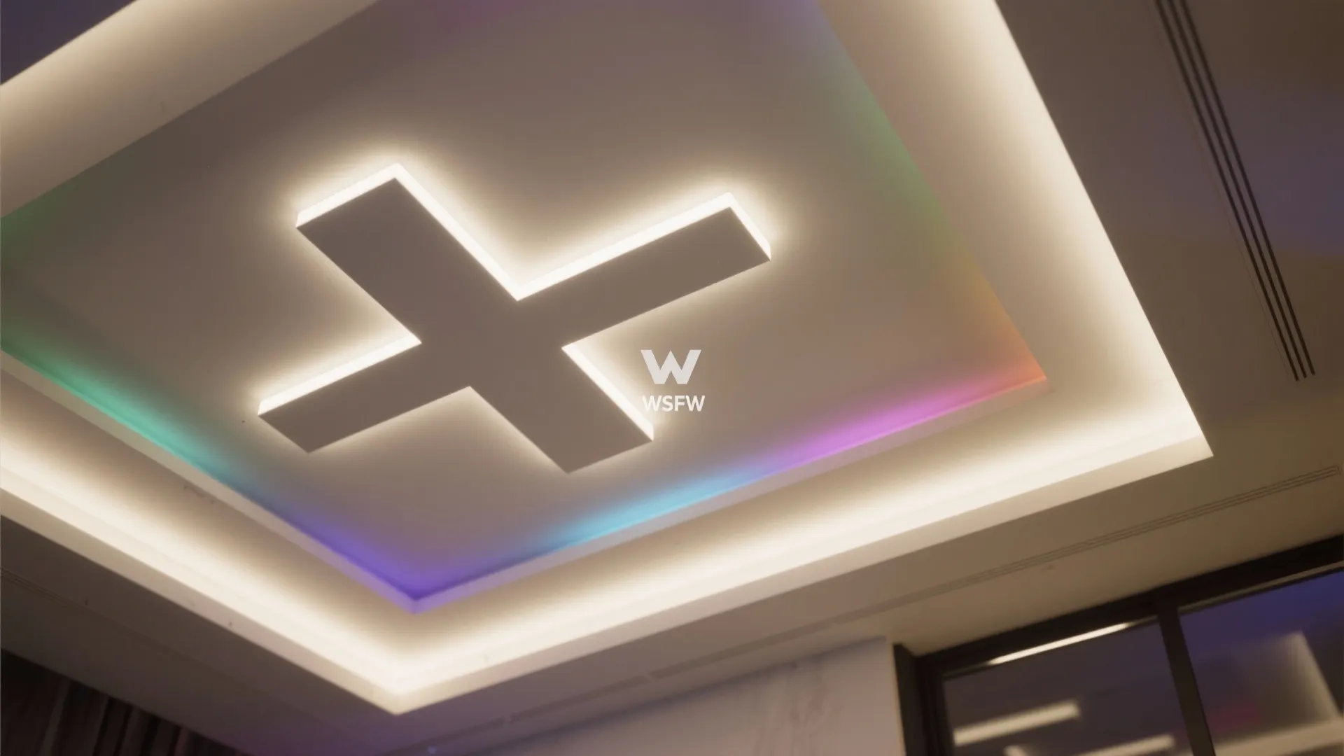 Top-down view of geometric plus-minus ceiling with tunable white cove and subtle RGB accents for mood shifts