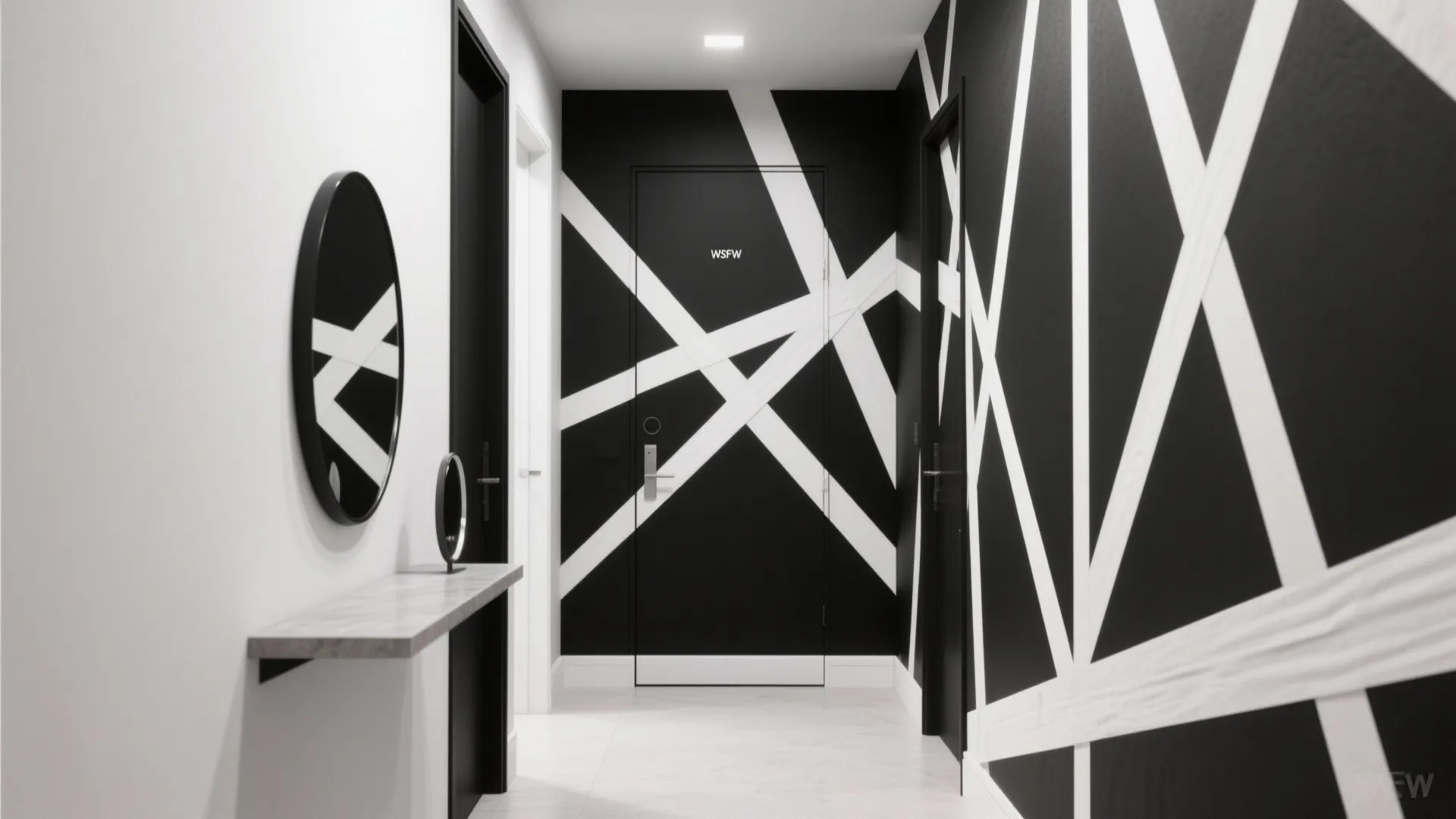 Modern hallway with black and white geometric wall design round mirror and small marble table