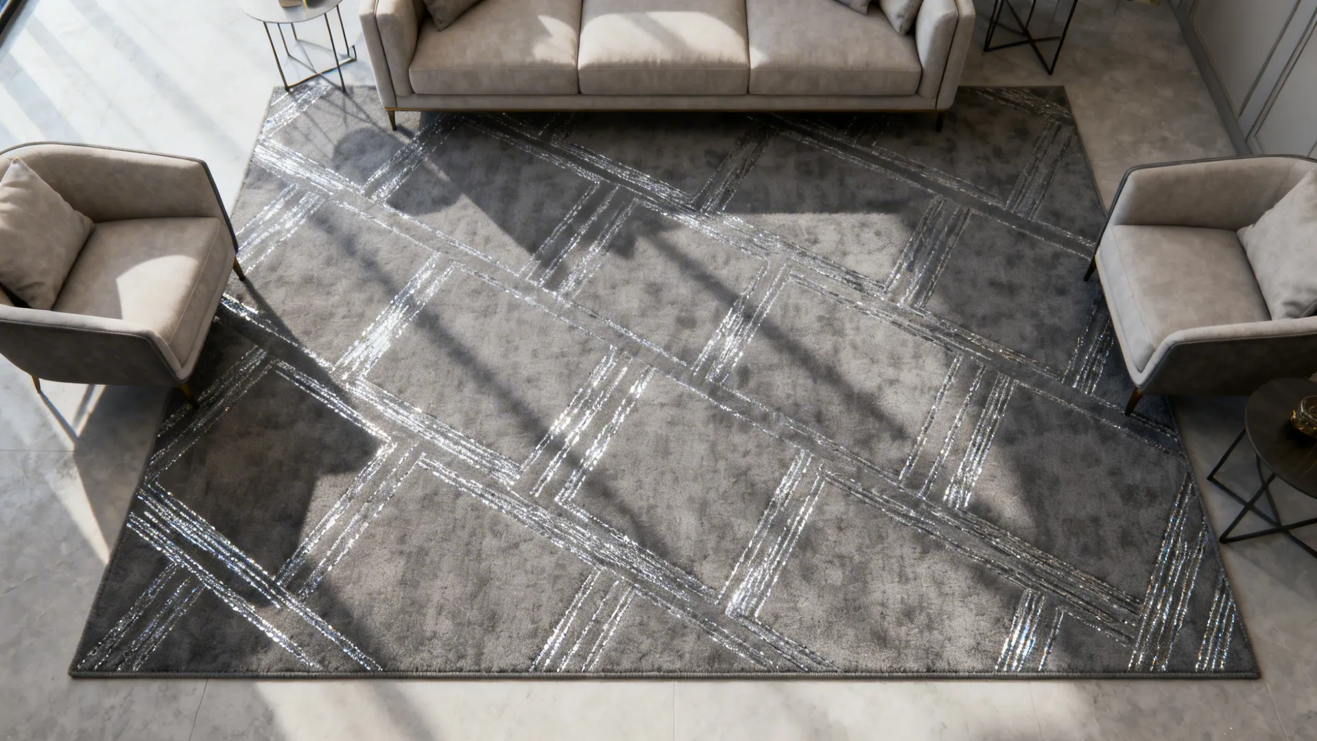 Living room with a geometric grey rug woven with subtle silver threads.