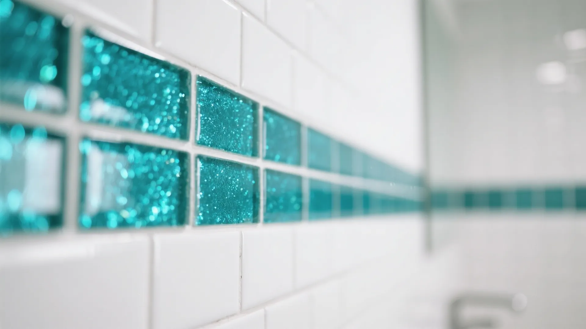 White subway tile wall with shimmering teal glass accent strip