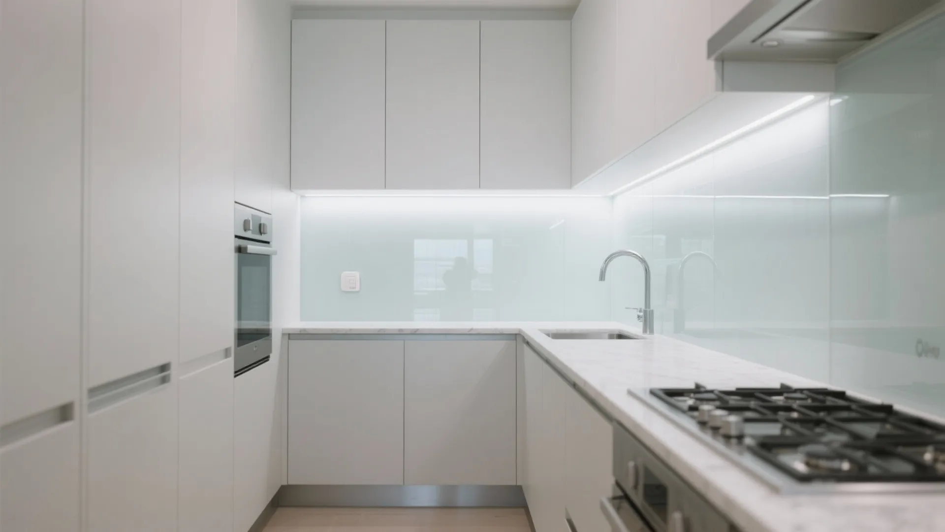 A Glass Backsplash for Light, Depth, and Easy Cleanups