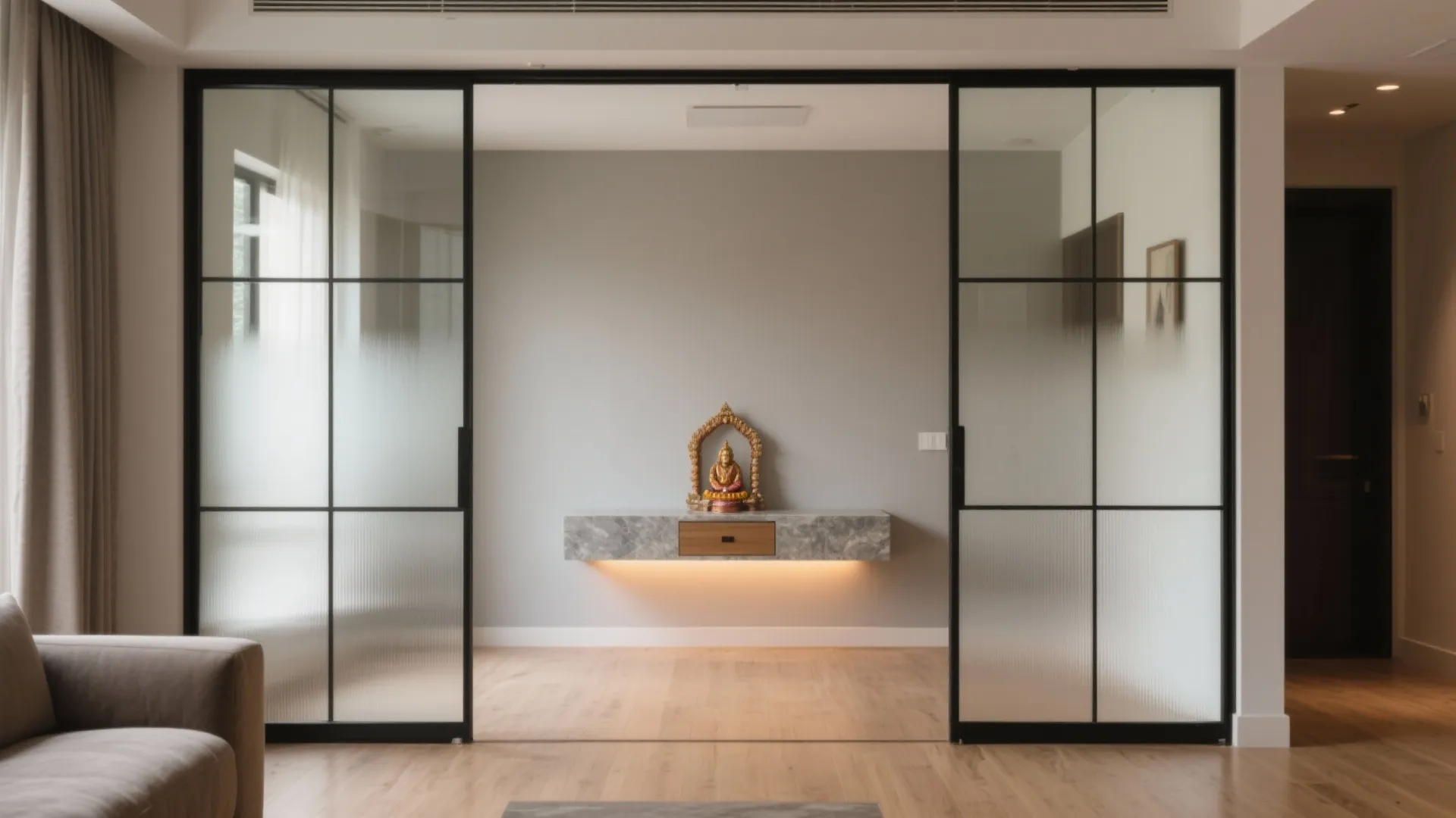 Glass-partitioned pooja corner with sliding screen