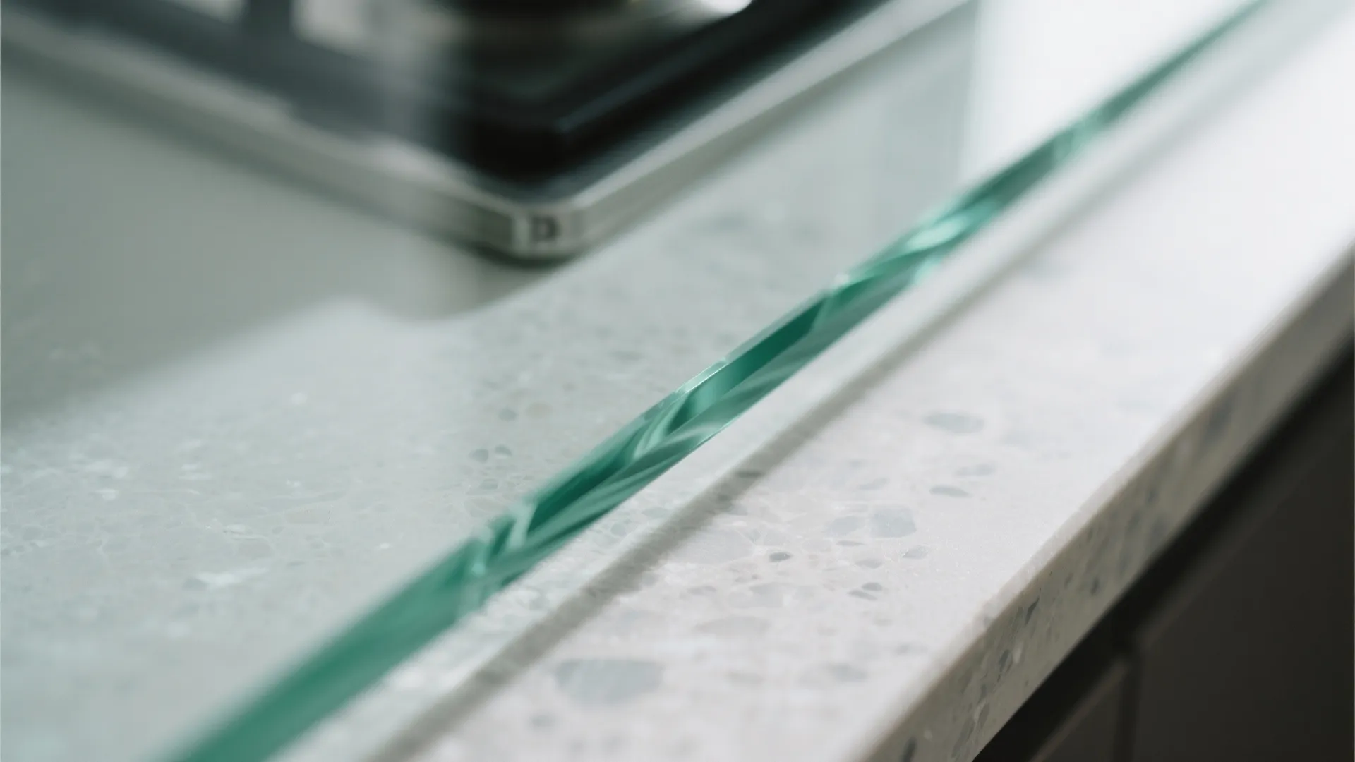 Glass backsplash for openness and easy cleaning