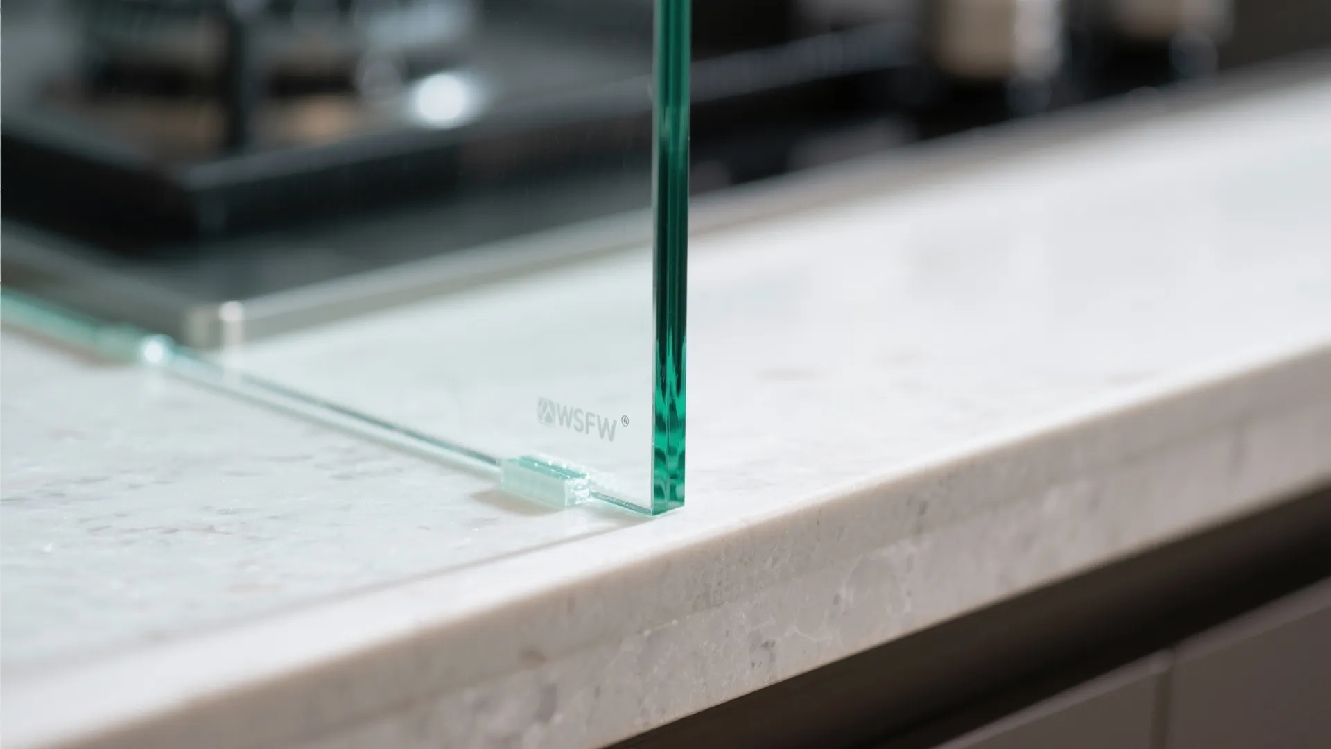 Glass backsplash for a brighter galley