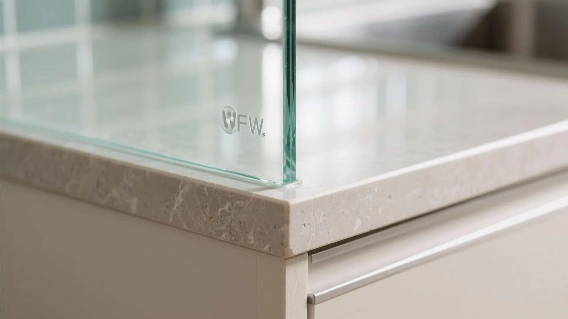 Glass backsplash for depth and easy cleaning