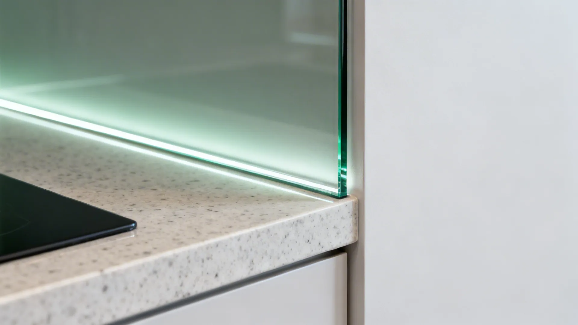 Glass backsplash for brighter, snow-season light