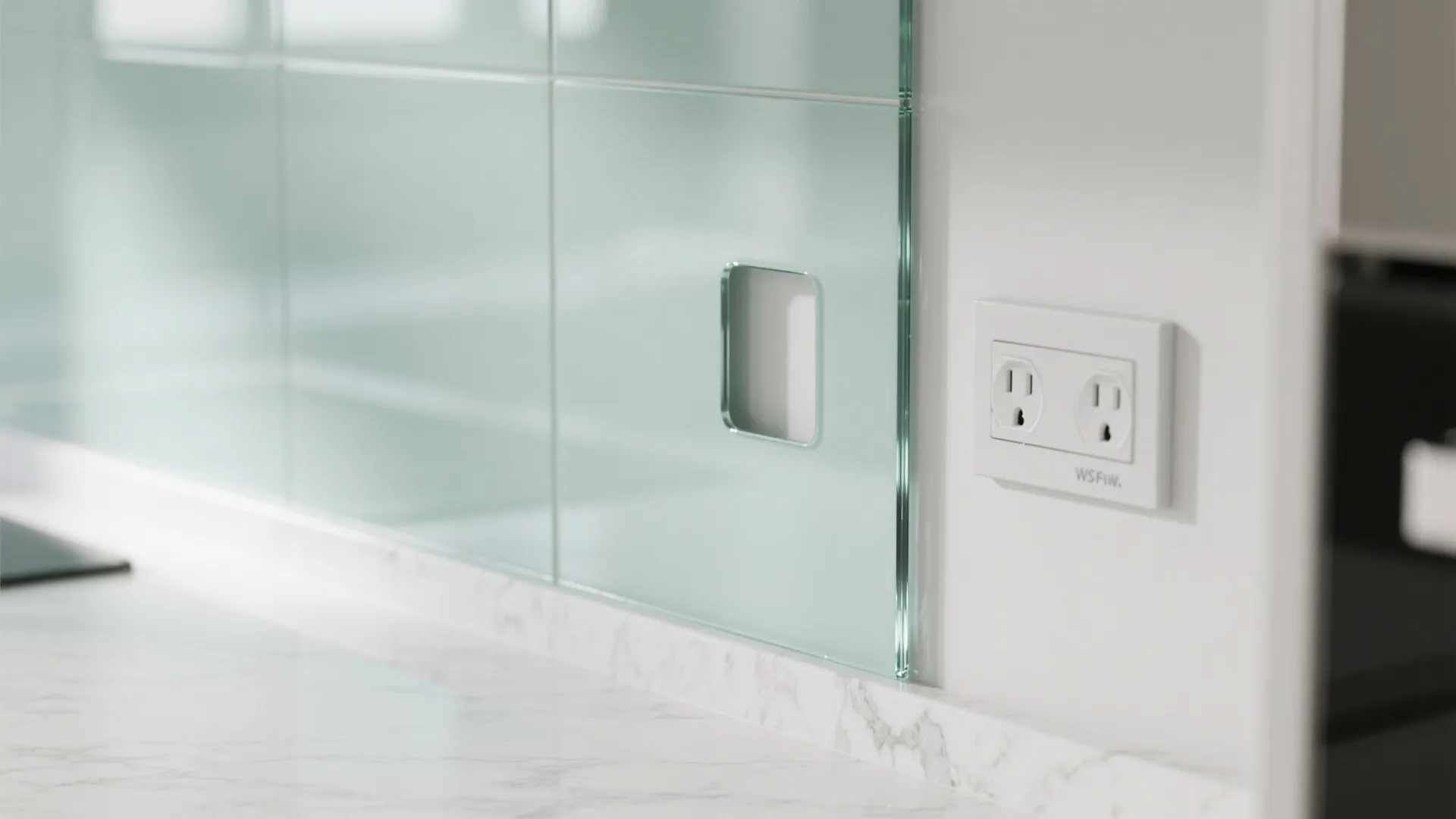 A glass backsplash for light, depth, and easy cleaning