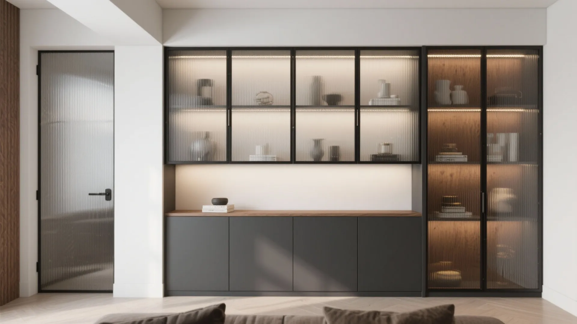 Modern grey cabinet with fluted glass doors and integrated light fixture in a bright room