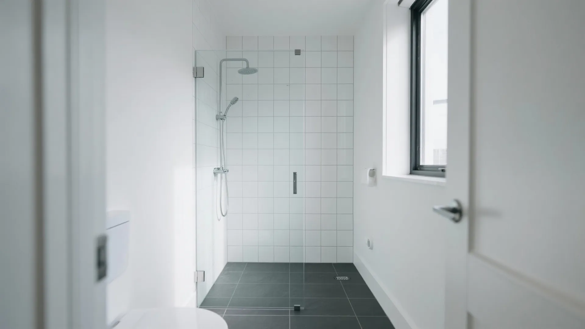 6. Glass Shower with White Backdrop