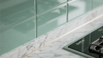 Mint Green Kitchen Backsplash with Marble Countertop