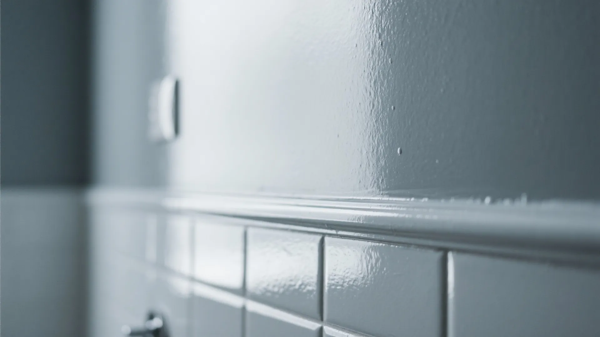 Gloss finish gray wall reflecting soft ambient light