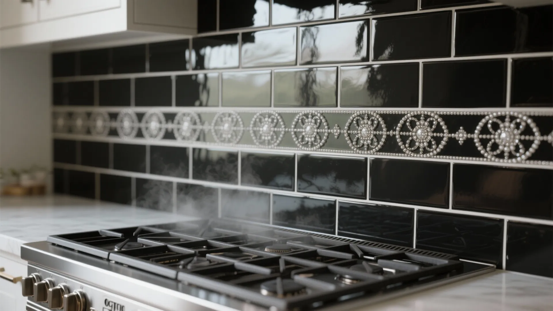 Glossy black subway wall tiles with a decorative white border behind a modern gas stove