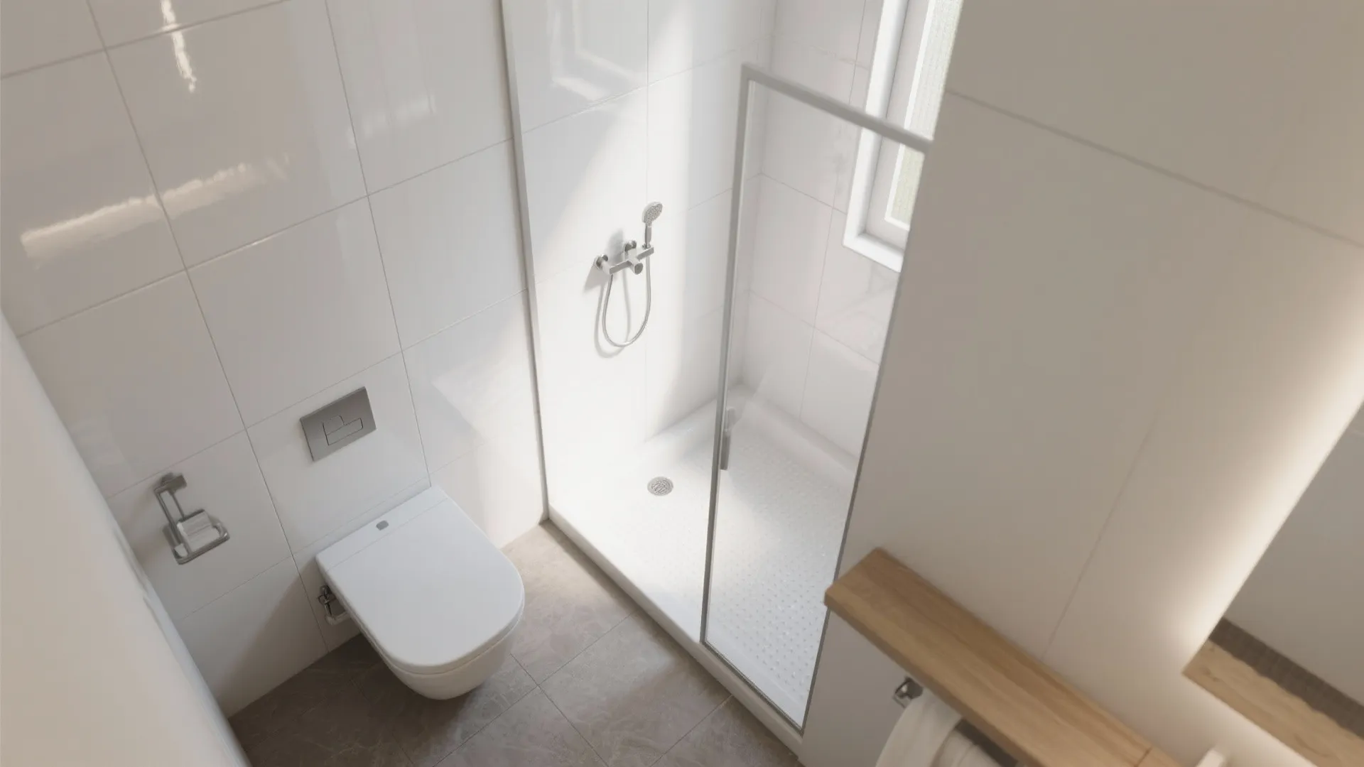 Modern white bathroom with top-down view of toilet glass shower door and grey floor tiles