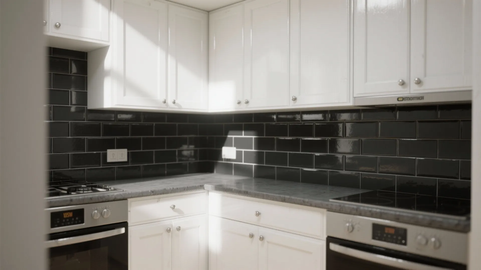 Compact kitchen with glossy white cabinets and polished black tile backsplash, highlighting reflections and durability