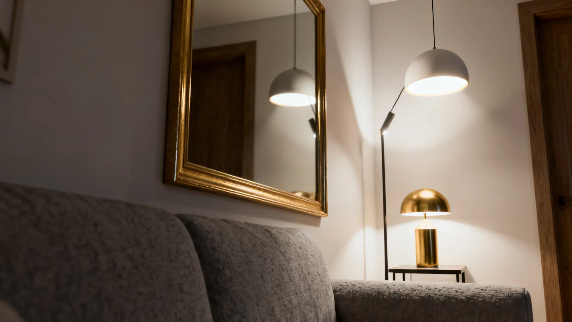 5. Soft Gold Mirrors and Layered Lighting