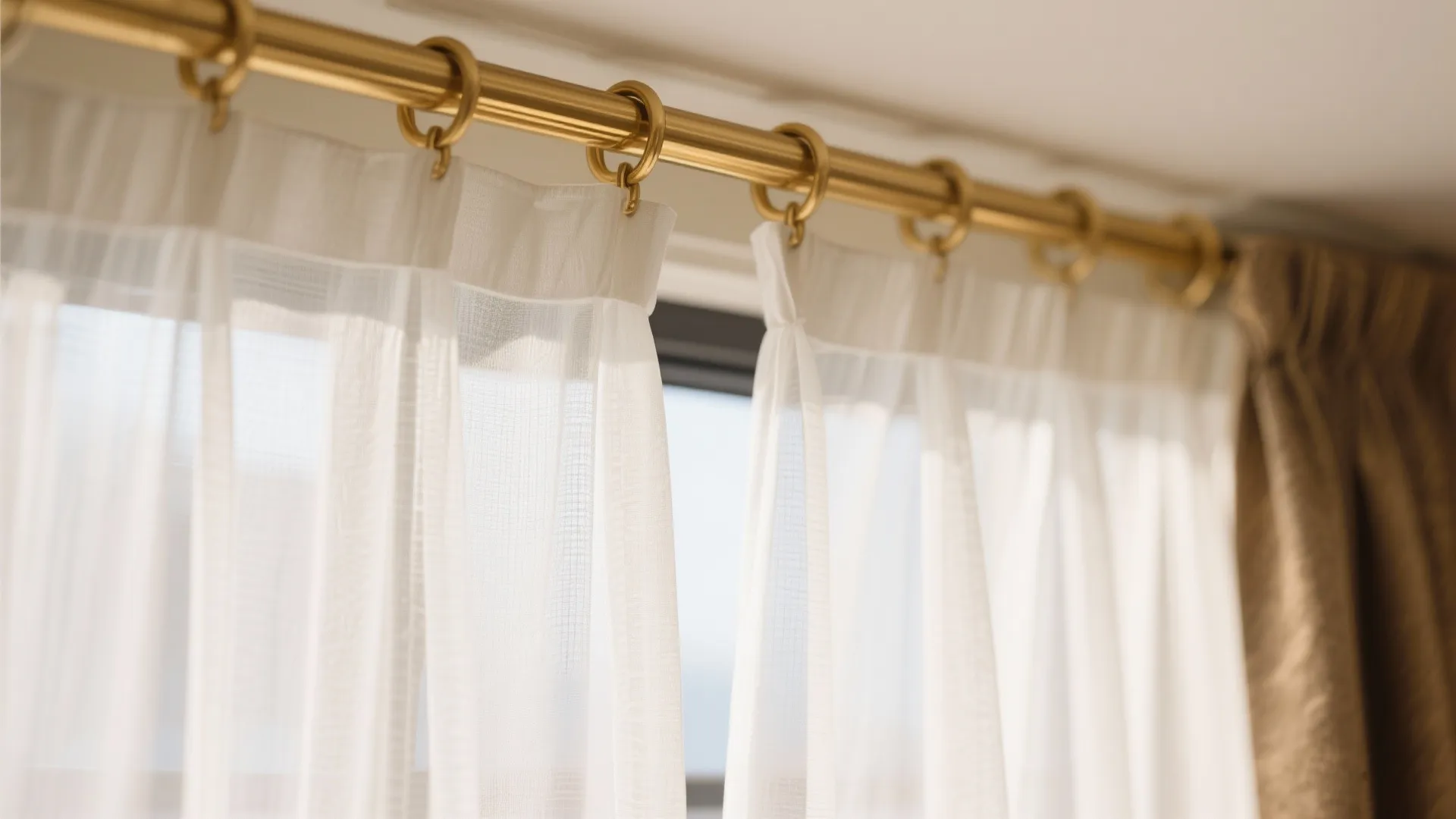 Golden Drapery Rods with Sheer White Curtains
