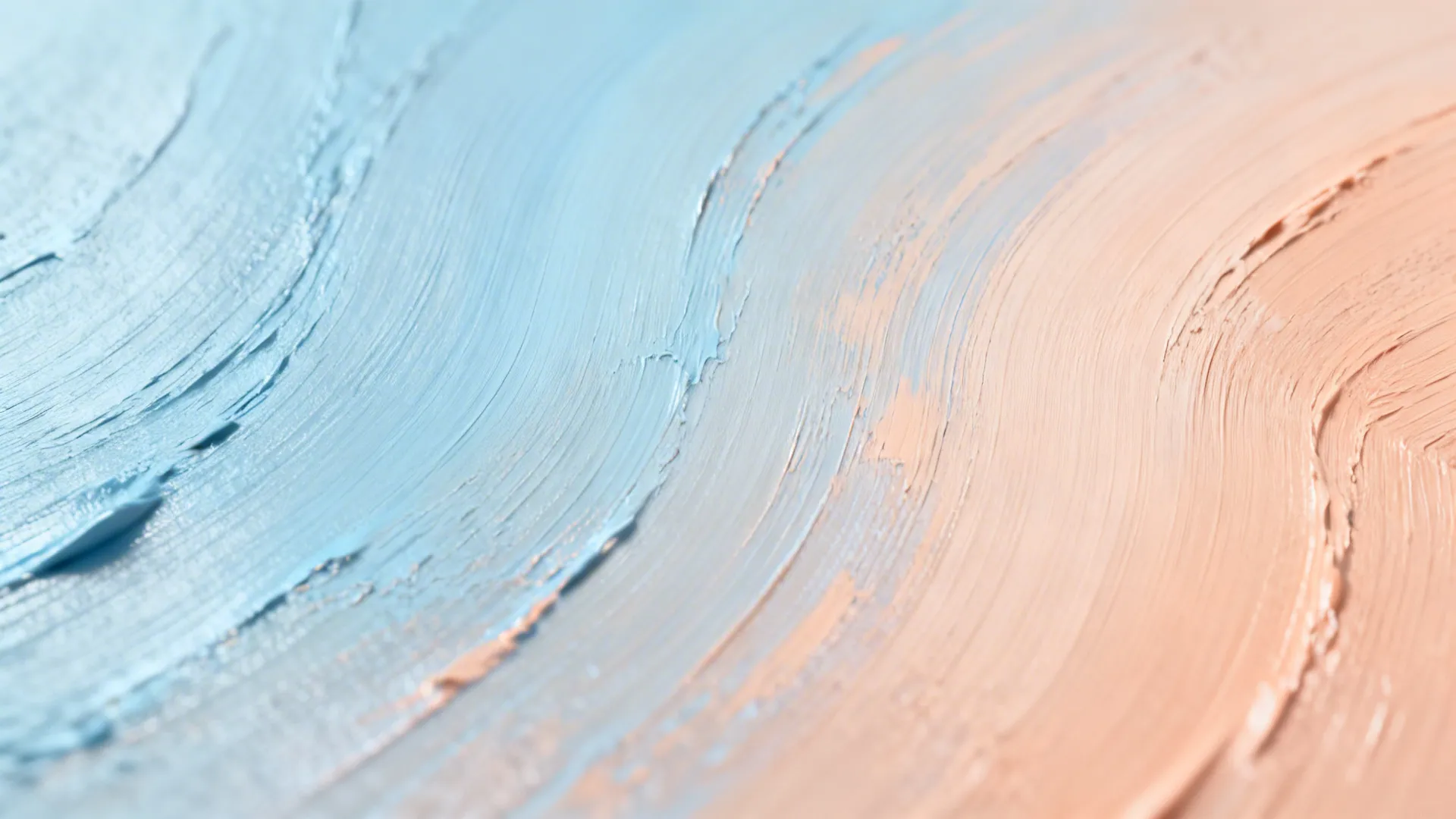 Close-up of a pastel gradient mural showing smooth paint blending and brush texture.