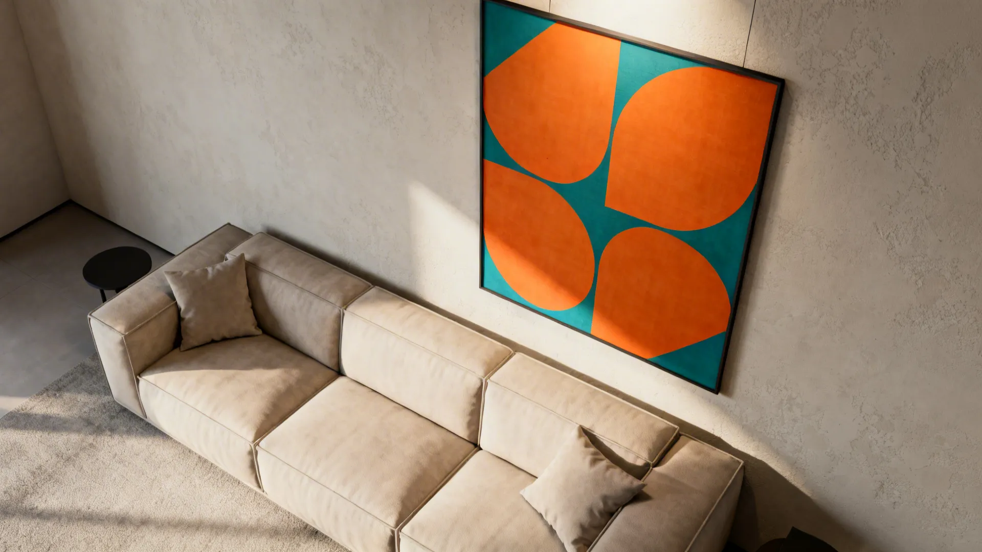 Minimalist living room with large orange-and-teal graphic artwork as the focal point.