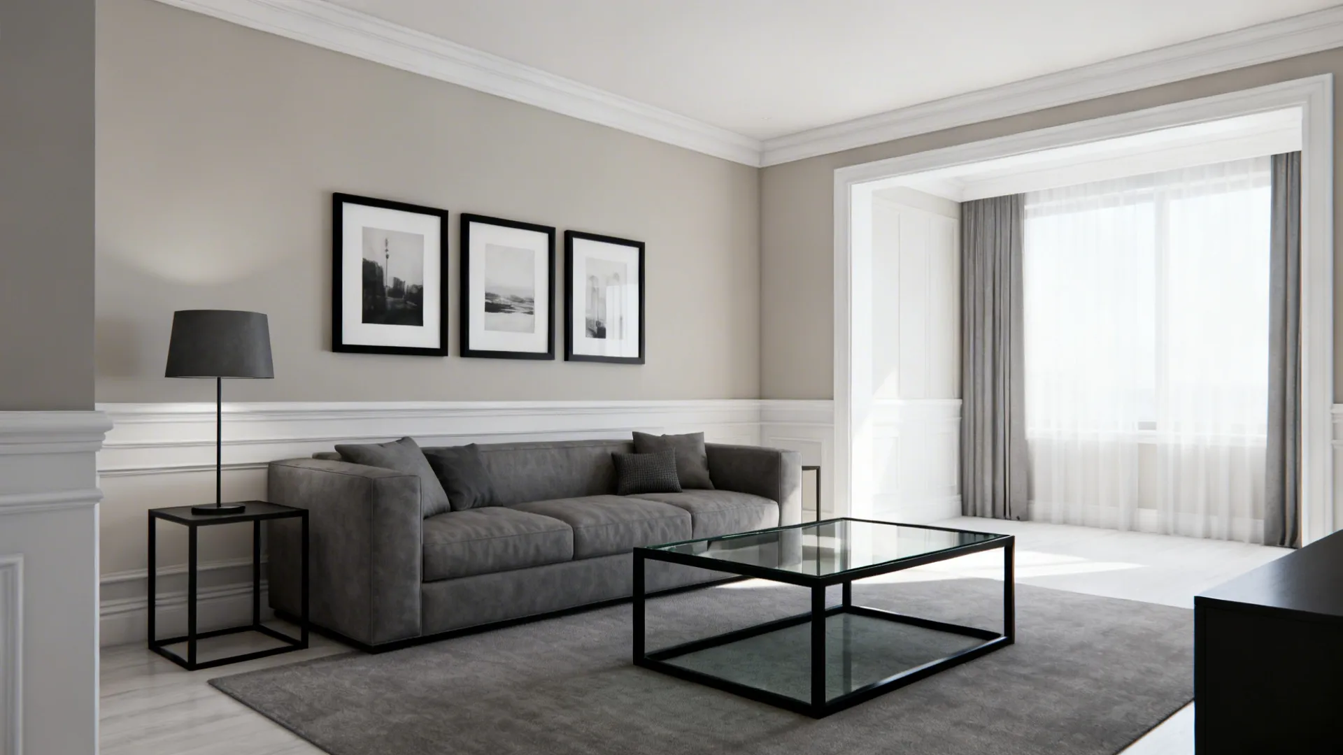Grey and white living room with slim graphite frames, lamp, and a black-framed table.
