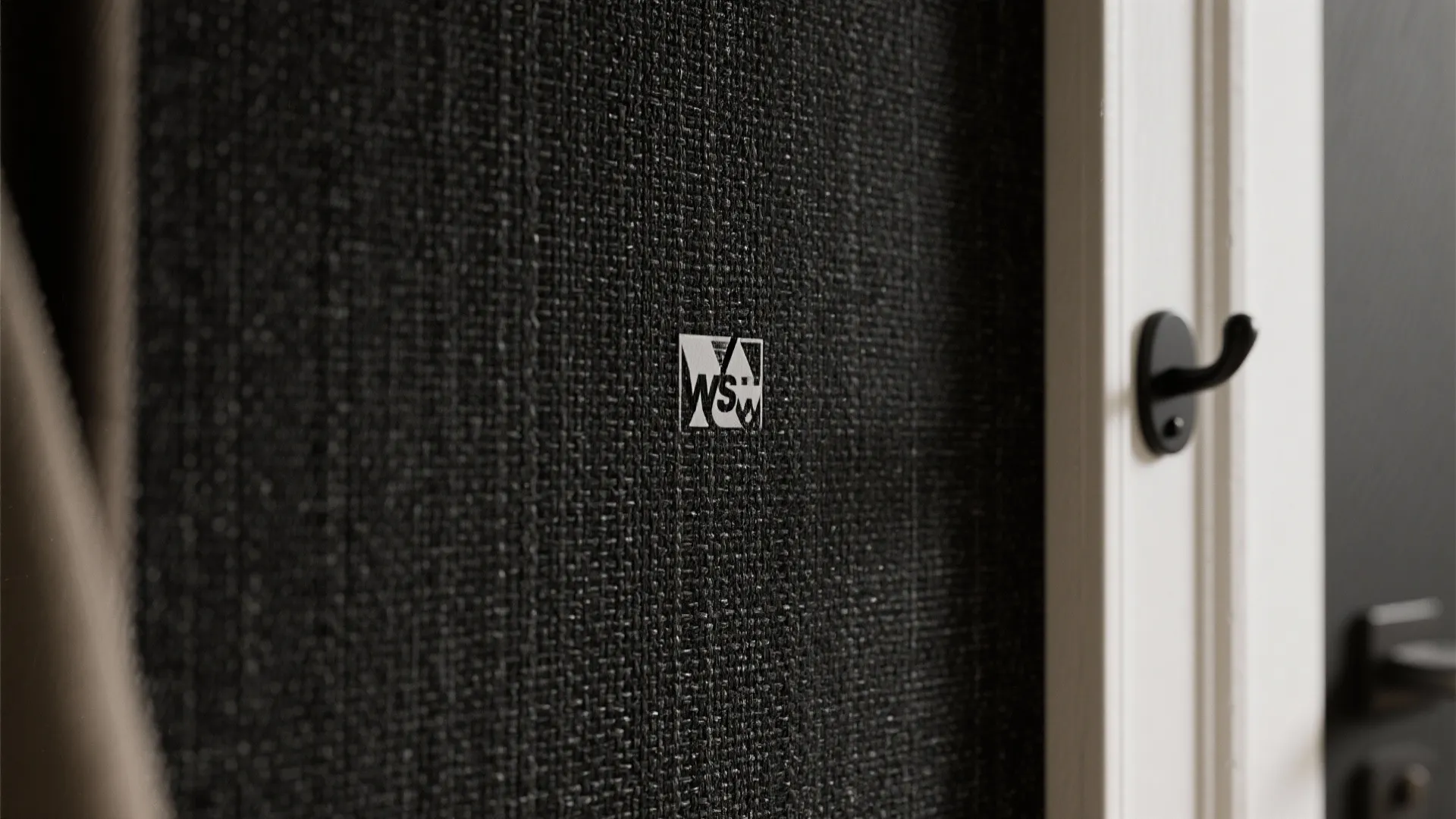 1) Minimalist black grasscloth in the entry