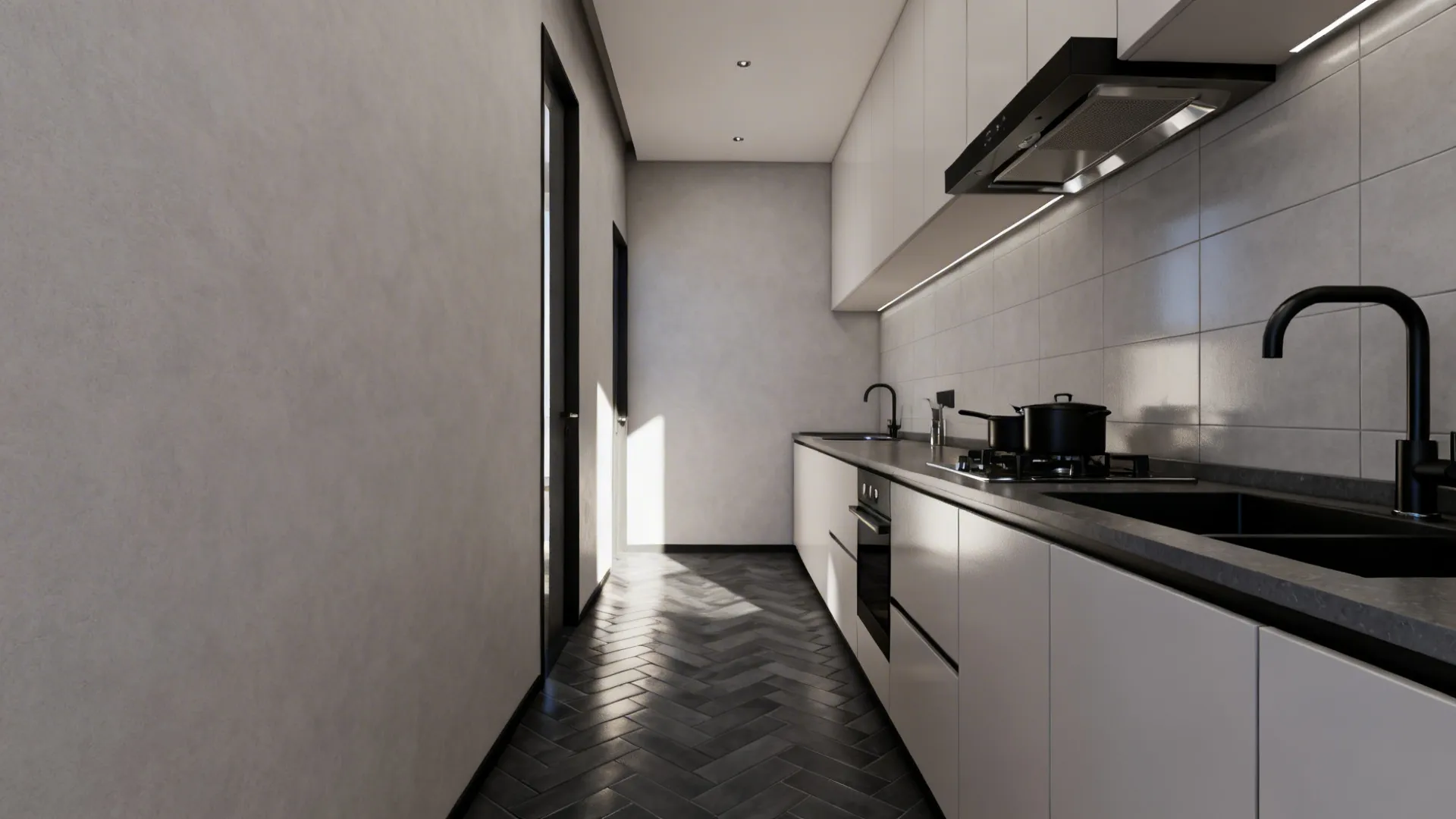 Pale gray wall tiles with a charcoal herringbone porcelain floor in a narrow galley kitchen.