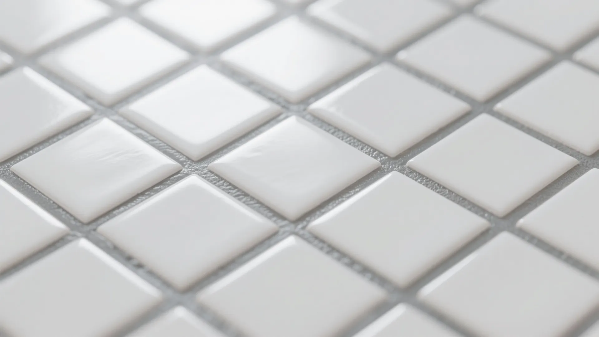White subway tiles with subtle gray grout emphasizing tile geometry and hiding dirt